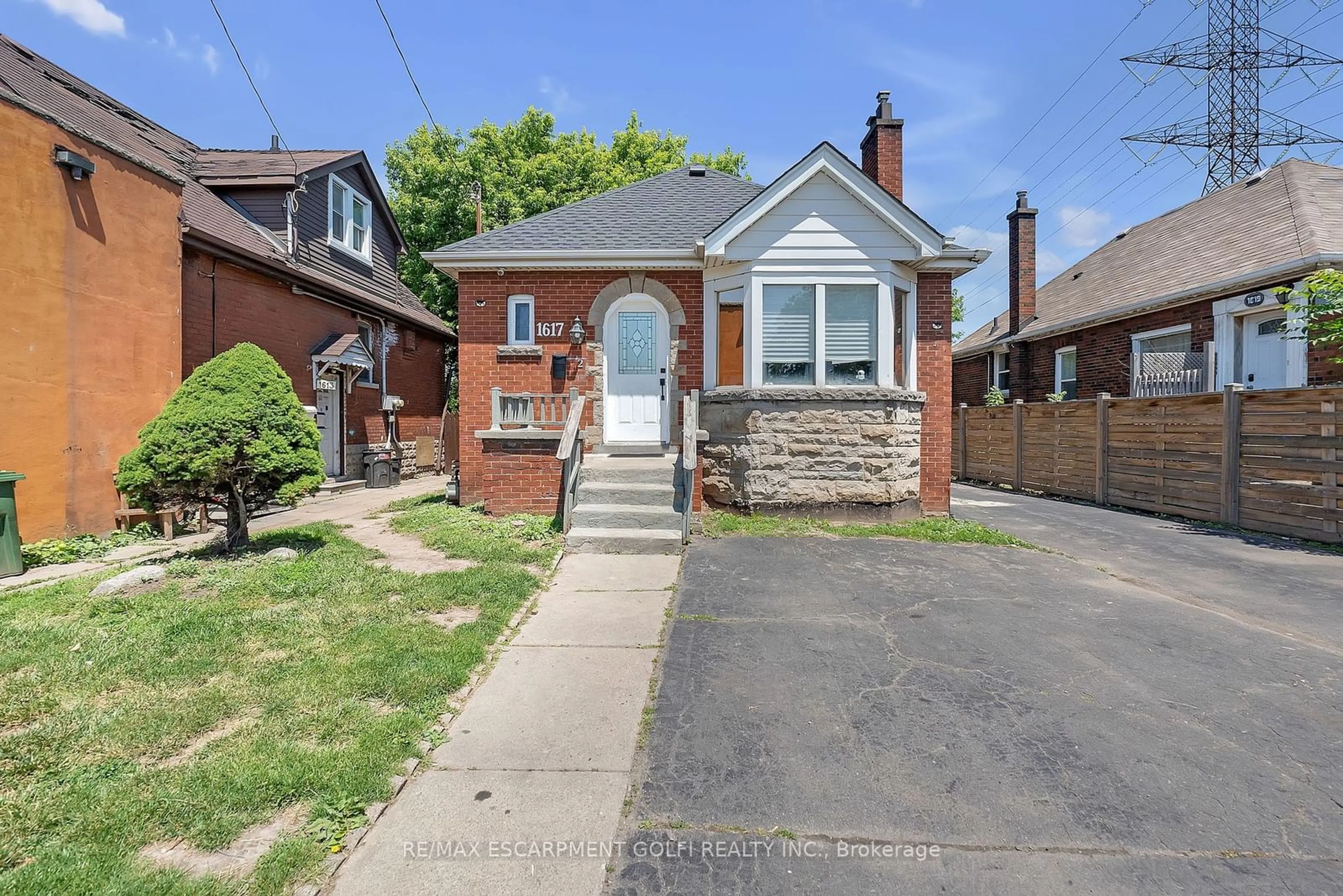 Home with brick exterior material, street for 1617 Main St, Hamilton Ontario L8H 1C4