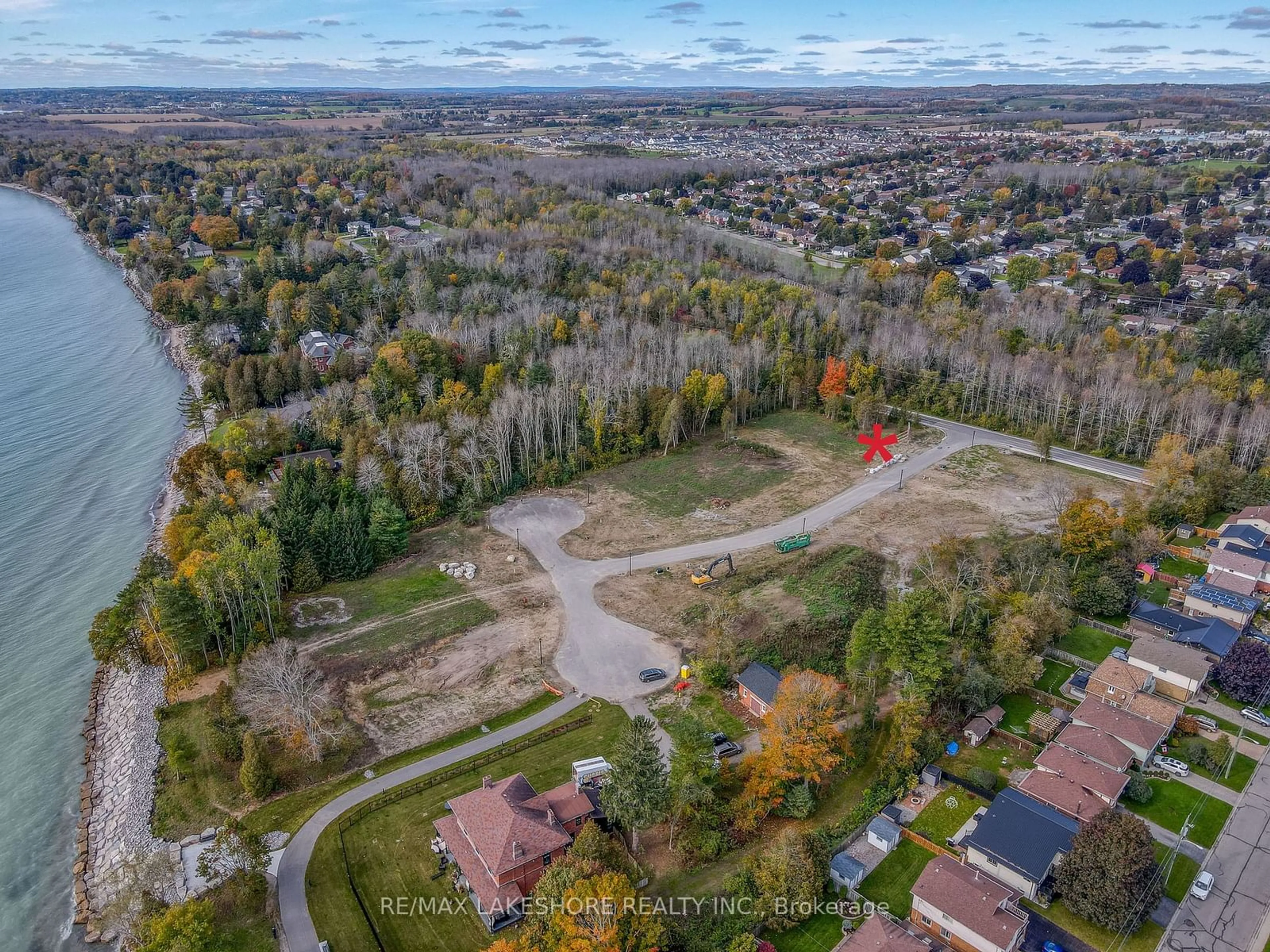 A pic from outside/outdoor area/front of a property/back of a property/a pic from drone, forest/trees view for 207 SUZANNE MESS Blvd, Cobourg Ontario K9A 3L3