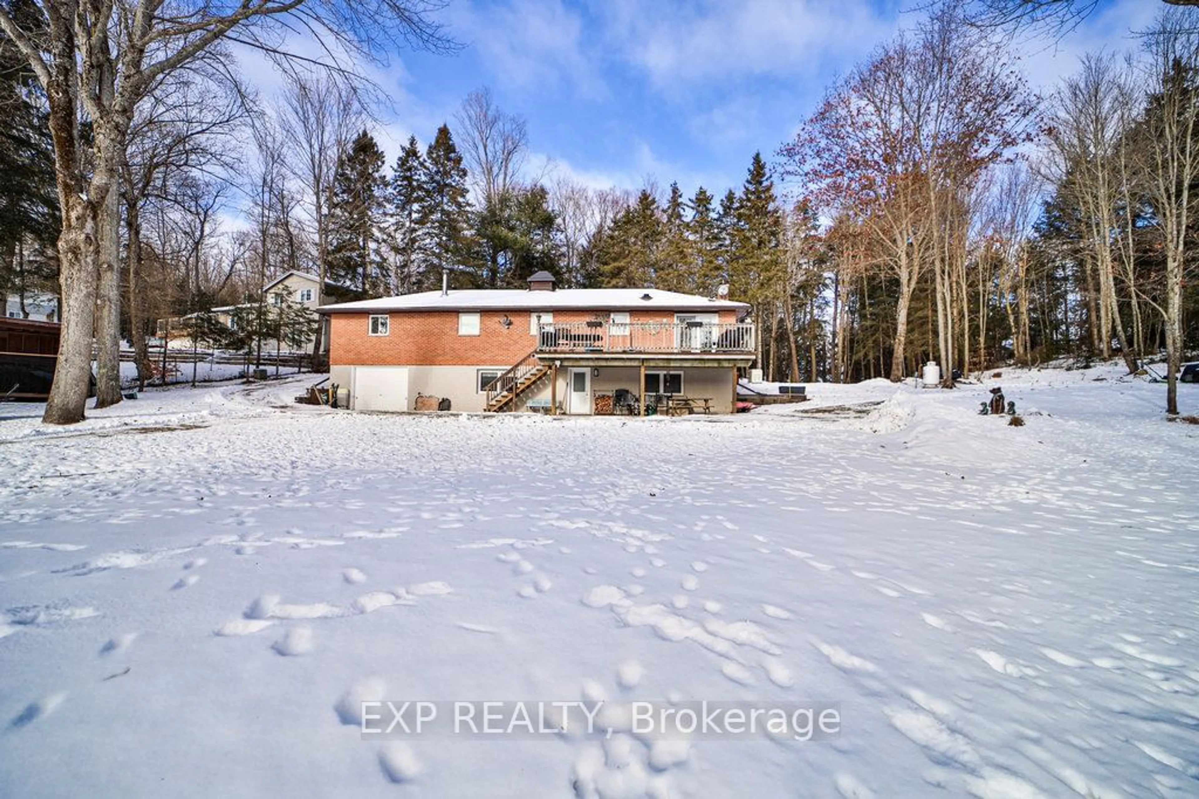 A pic from outside/outdoor area/front of a property/back of a property/a pic from drone, water/lake/river/ocean view for 40 Gilmour Point Rd, North Kawartha Ontario K0L 1A0