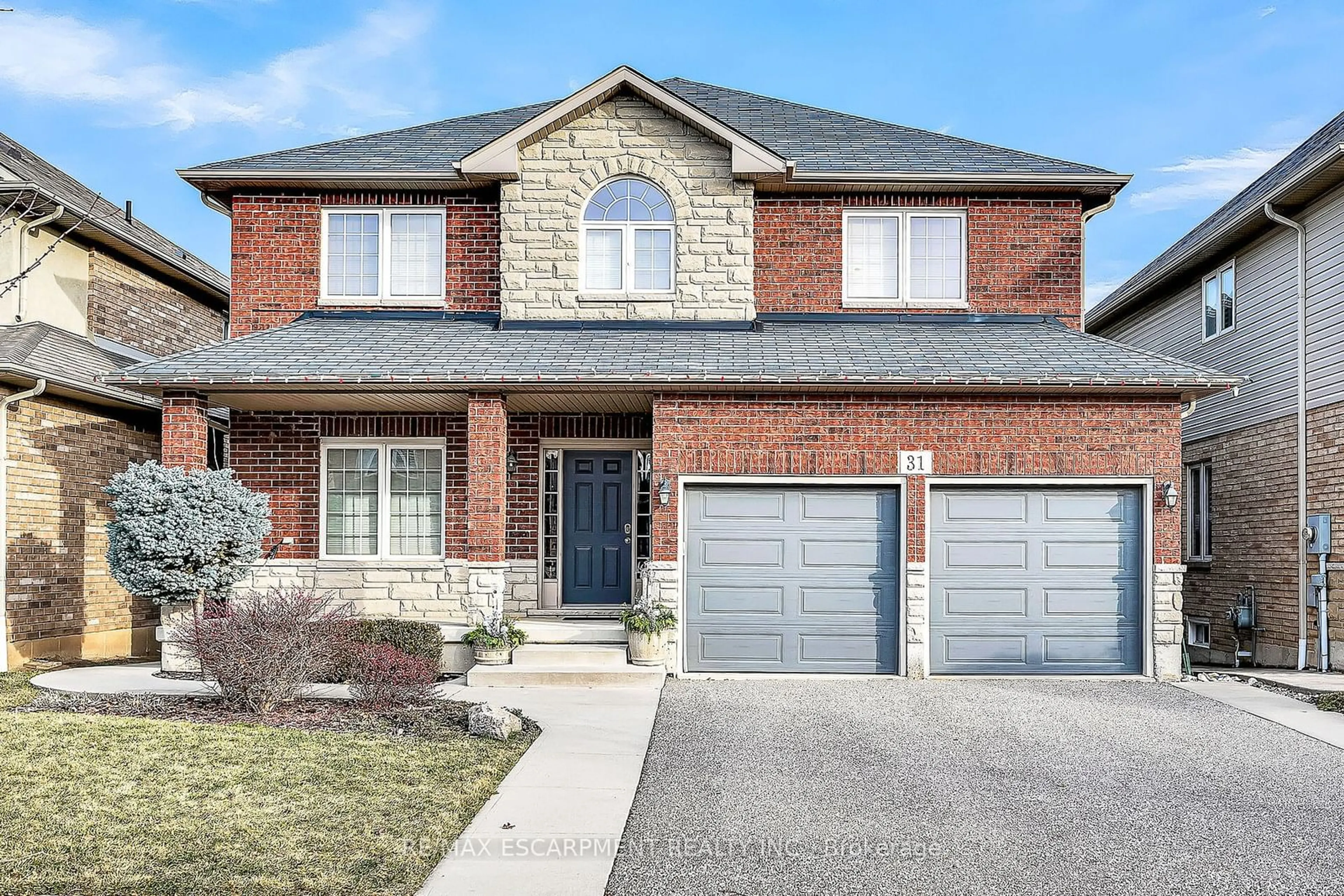 Home with brick exterior material, street for 31 Showcase Dr, Hamilton Ontario L0R 1P0