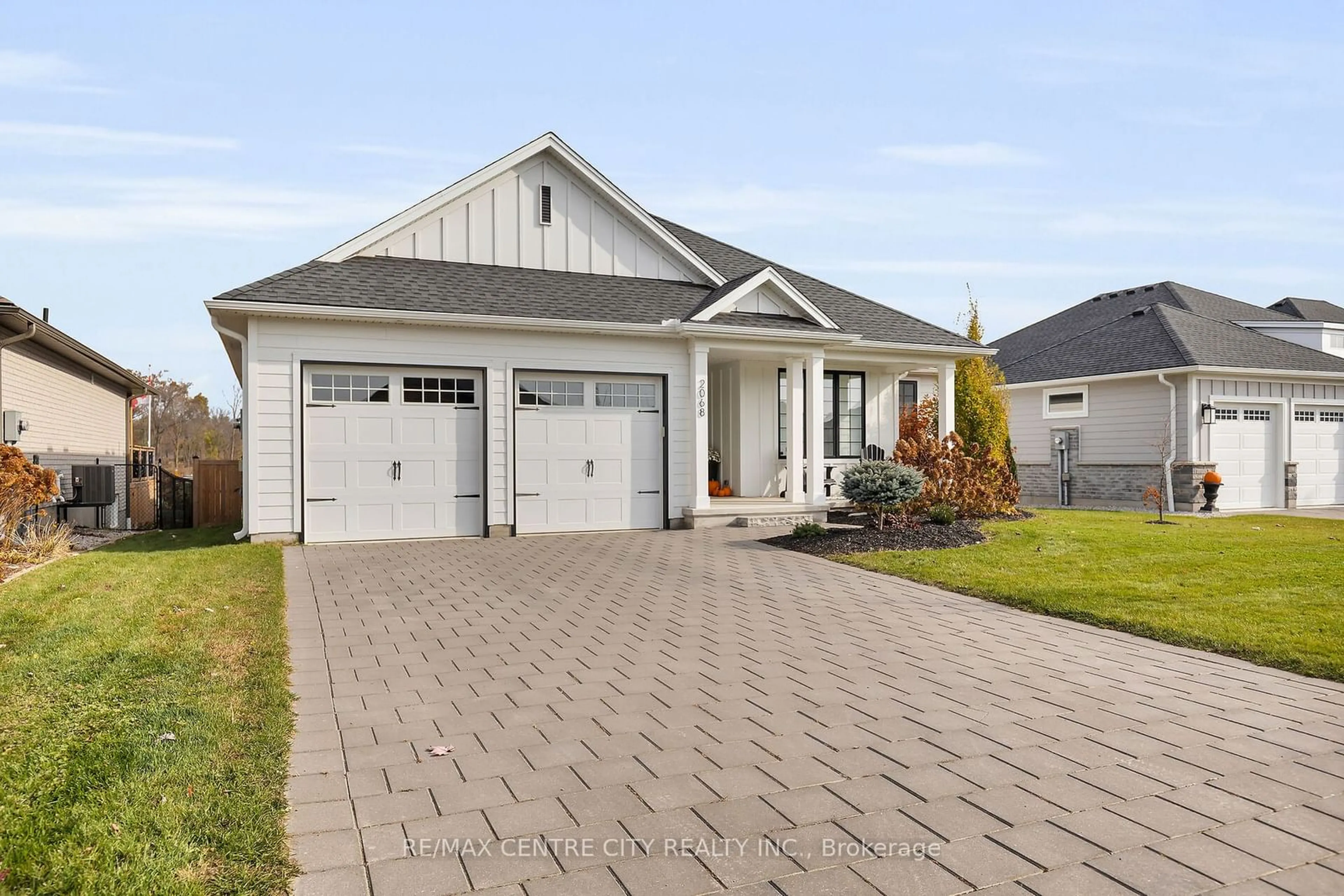 Home with vinyl exterior material, street for 2068 Lockwood Cres, Strathroy-Caradoc Ontario N0L 1W0