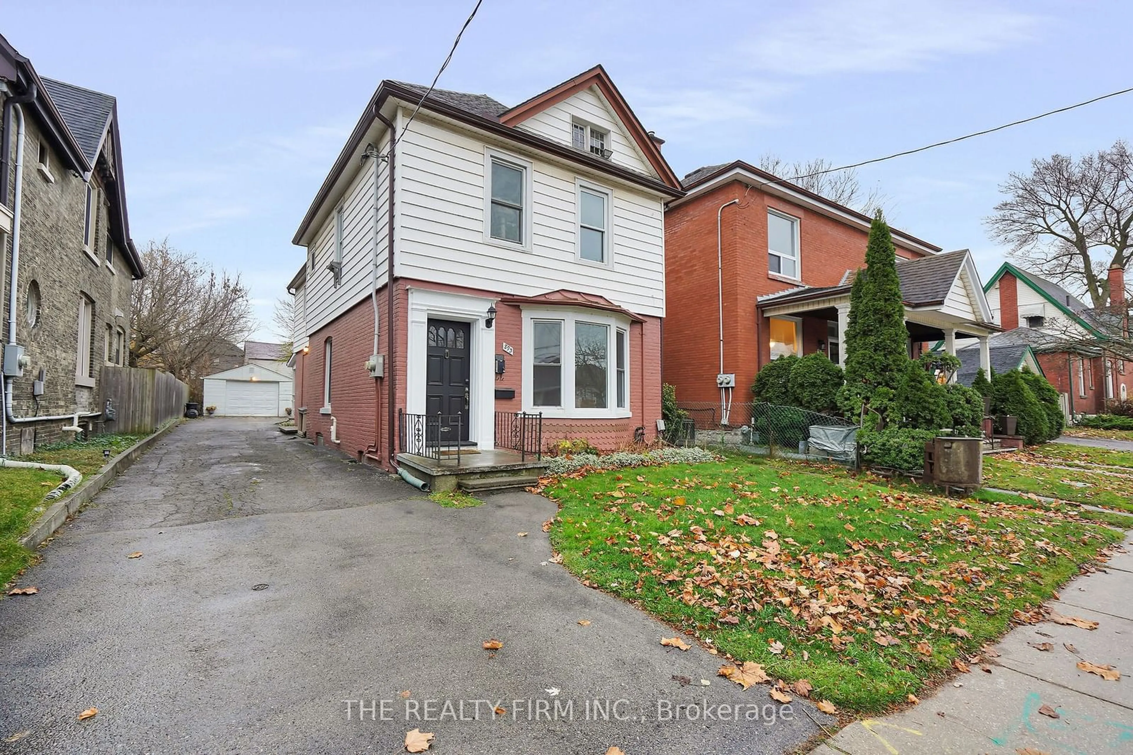 Home with brick exterior material, street for 893 Queens Ave, London Ontario N5W 3H9