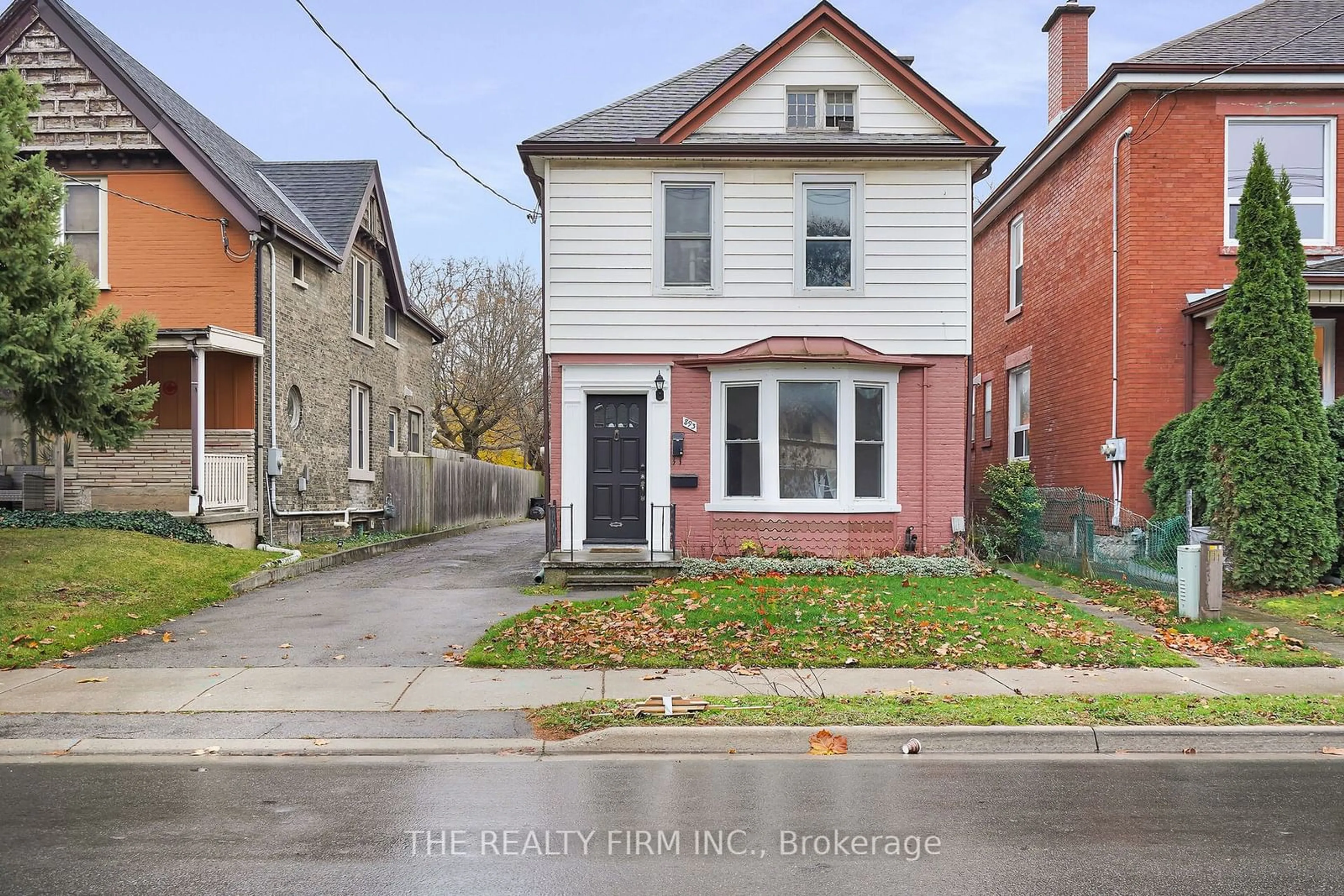 Home with brick exterior material, street for 893 Queens Ave, London Ontario N5W 3H9