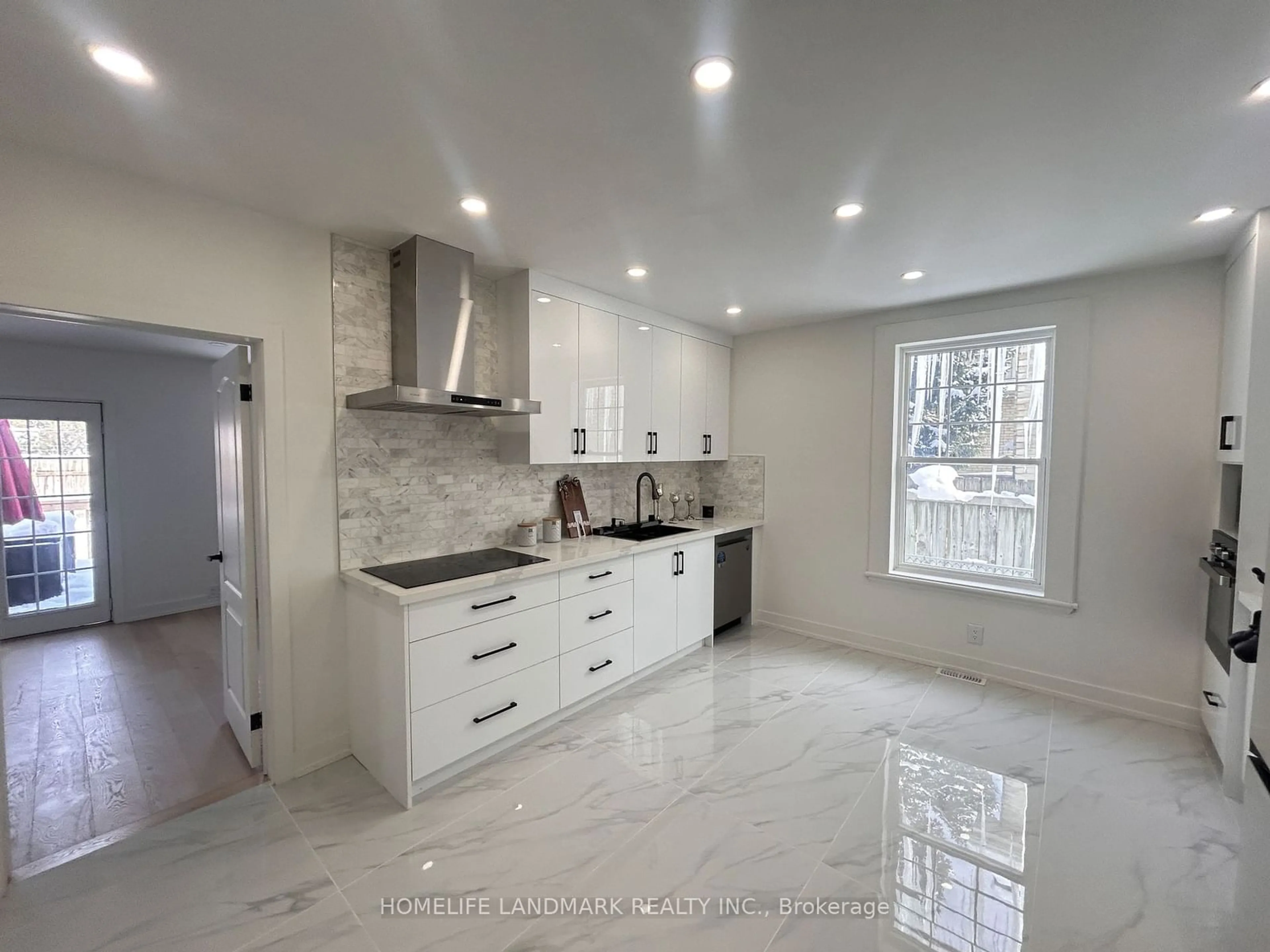 Open concept kitchen, ceramic/tile floor for 130 Langarth St, London Ontario N6C 1Z5