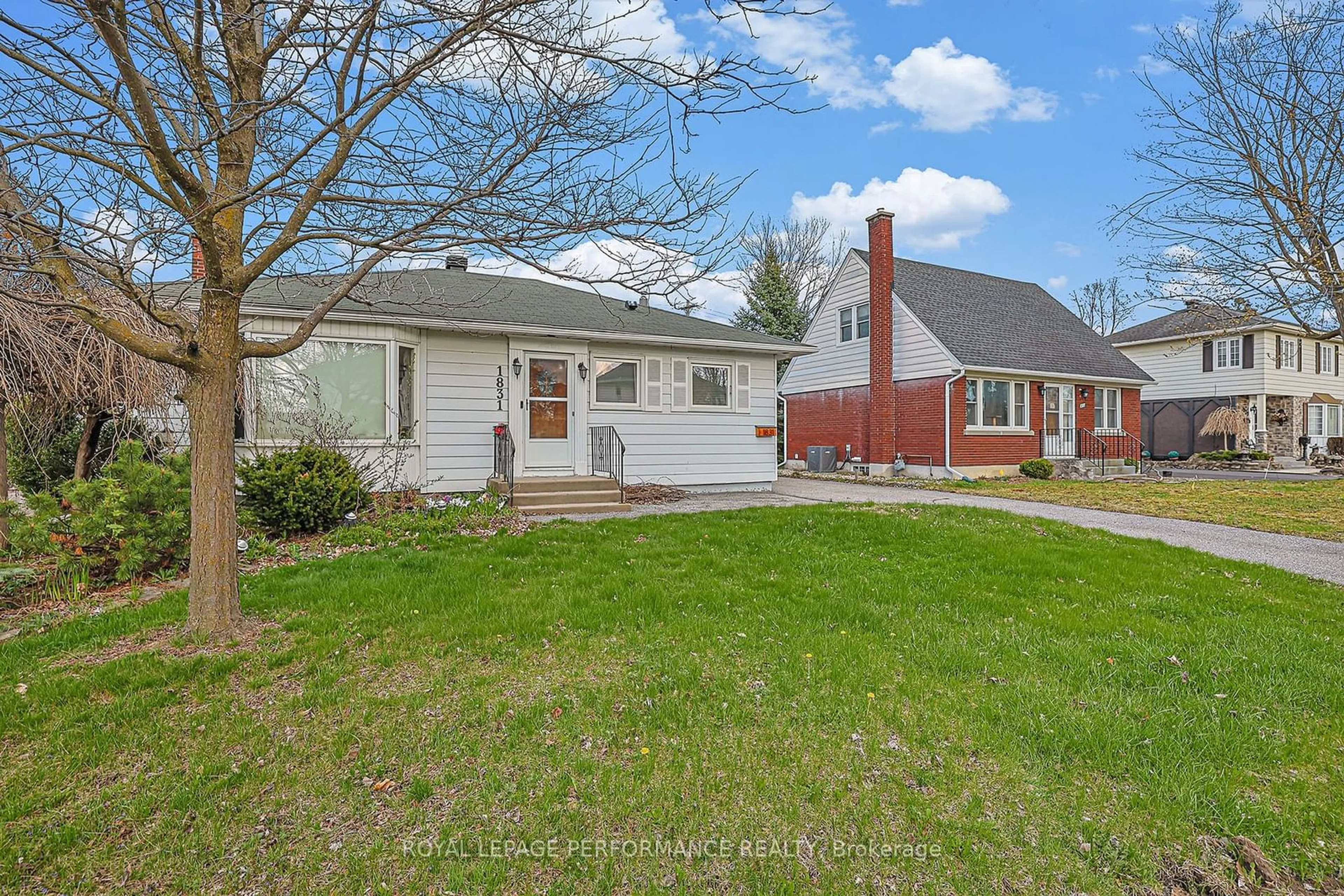 A pic from outside/outdoor area/front of a property/back of a property/a pic from drone, street for 1831 Haig Dr, Elmvale Acres and Area Ontario K1G 2J4