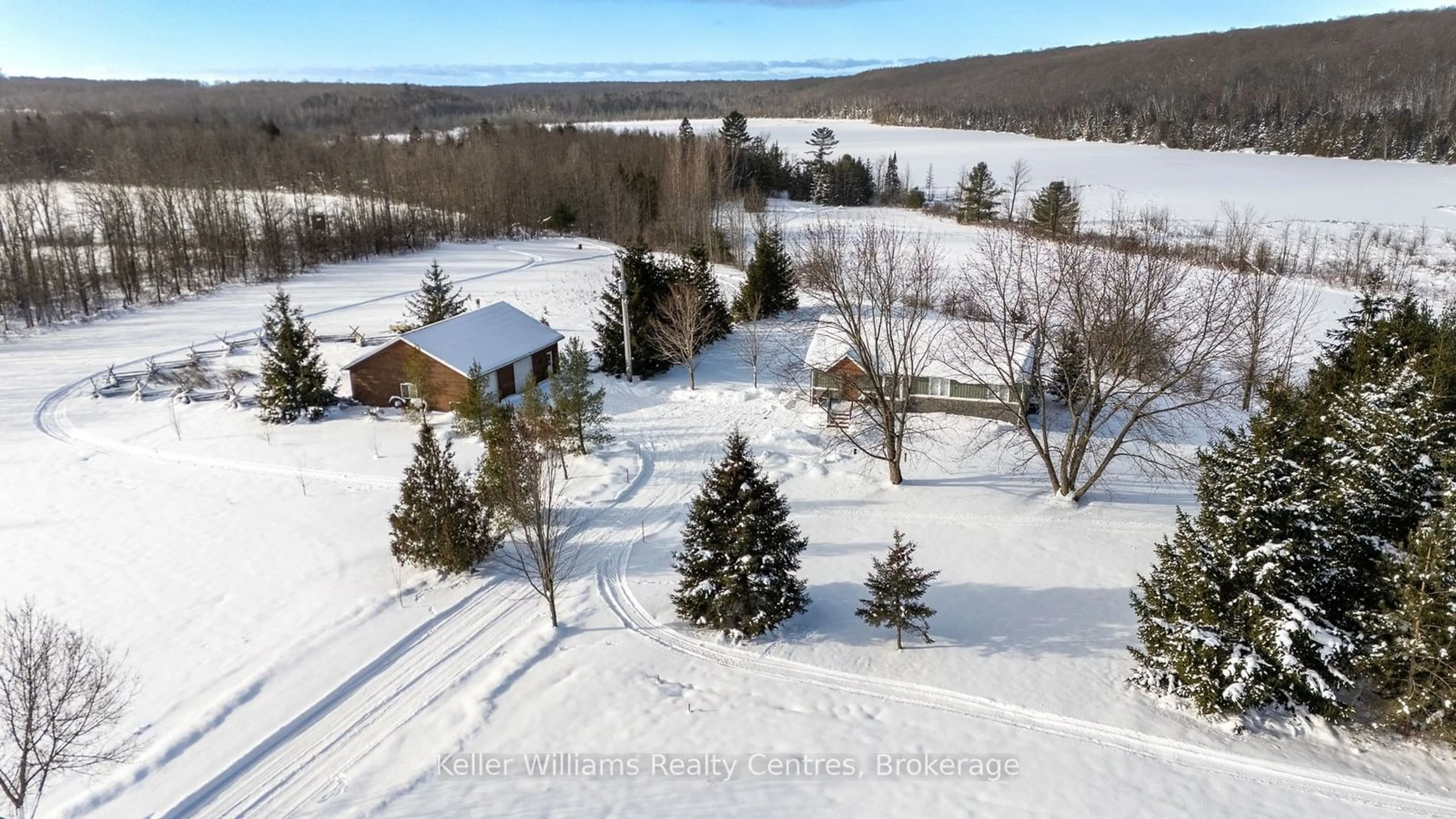 A pic from outside/outdoor area/front of a property/back of a property/a pic from drone, water/lake/river/ocean view for 210182 Burgess Sideroad, Georgian Bluffs Ontario N0H 1S0