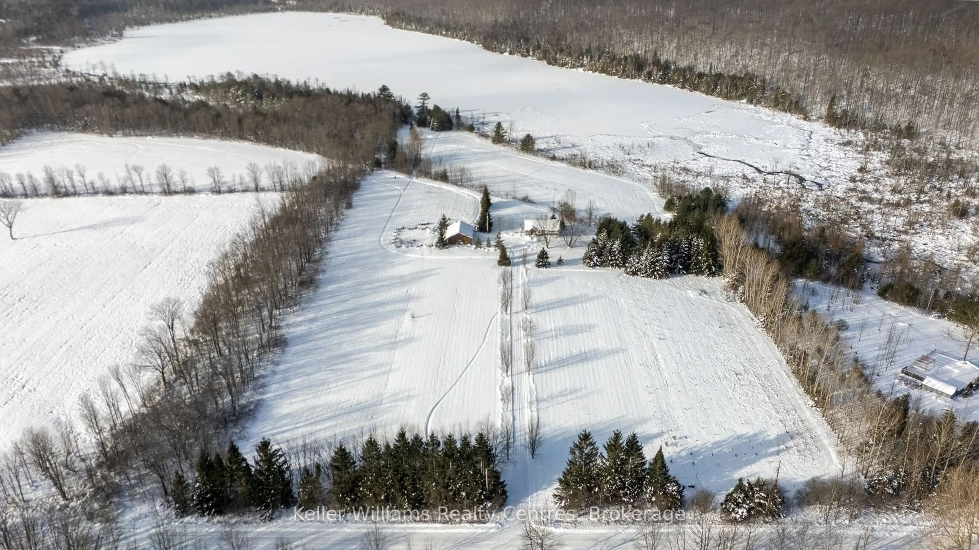 A pic from outside/outdoor area/front of a property/back of a property/a pic from drone, mountain view for 210182 Burgess Sideroad, Georgian Bluffs Ontario N0H 1S0