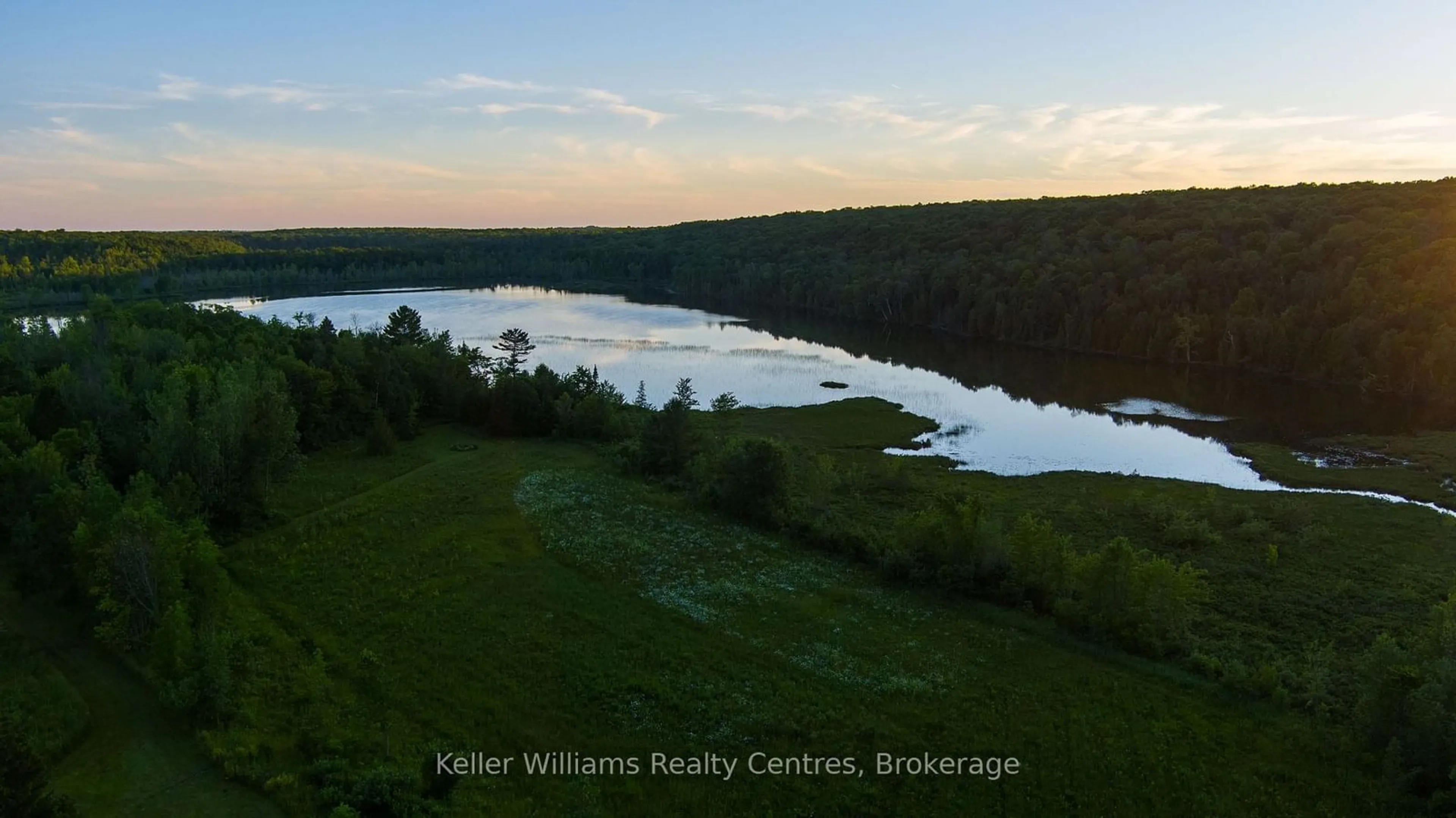 A pic from outside/outdoor area/front of a property/back of a property/a pic from drone, water/lake/river/ocean view for 210182 Burgess Sideroad, Georgian Bluffs Ontario N0H 1S0