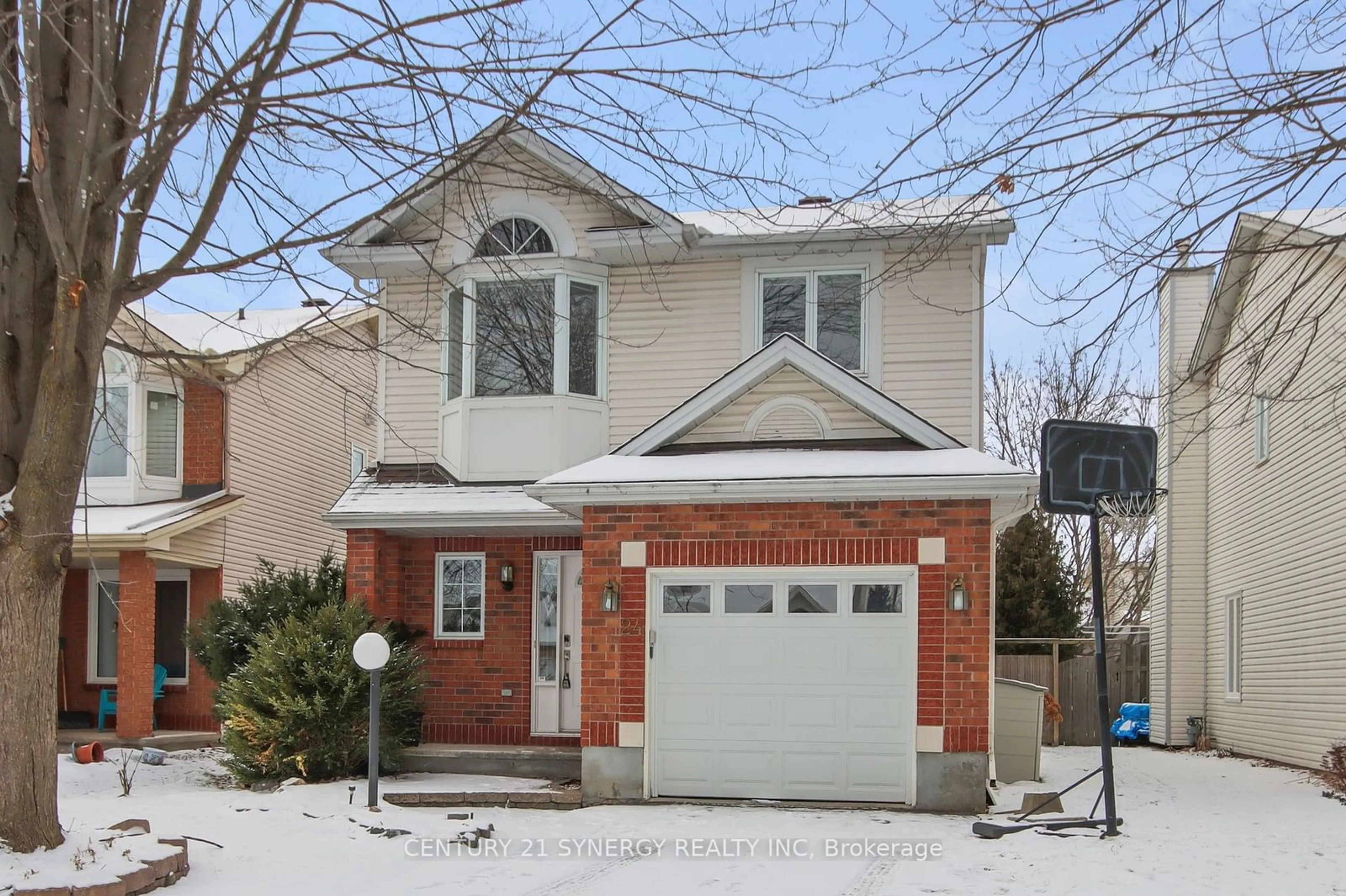 Home with brick exterior material, street for 24 Avonhurst Ave, Barrhaven Ontario K2J 4K9