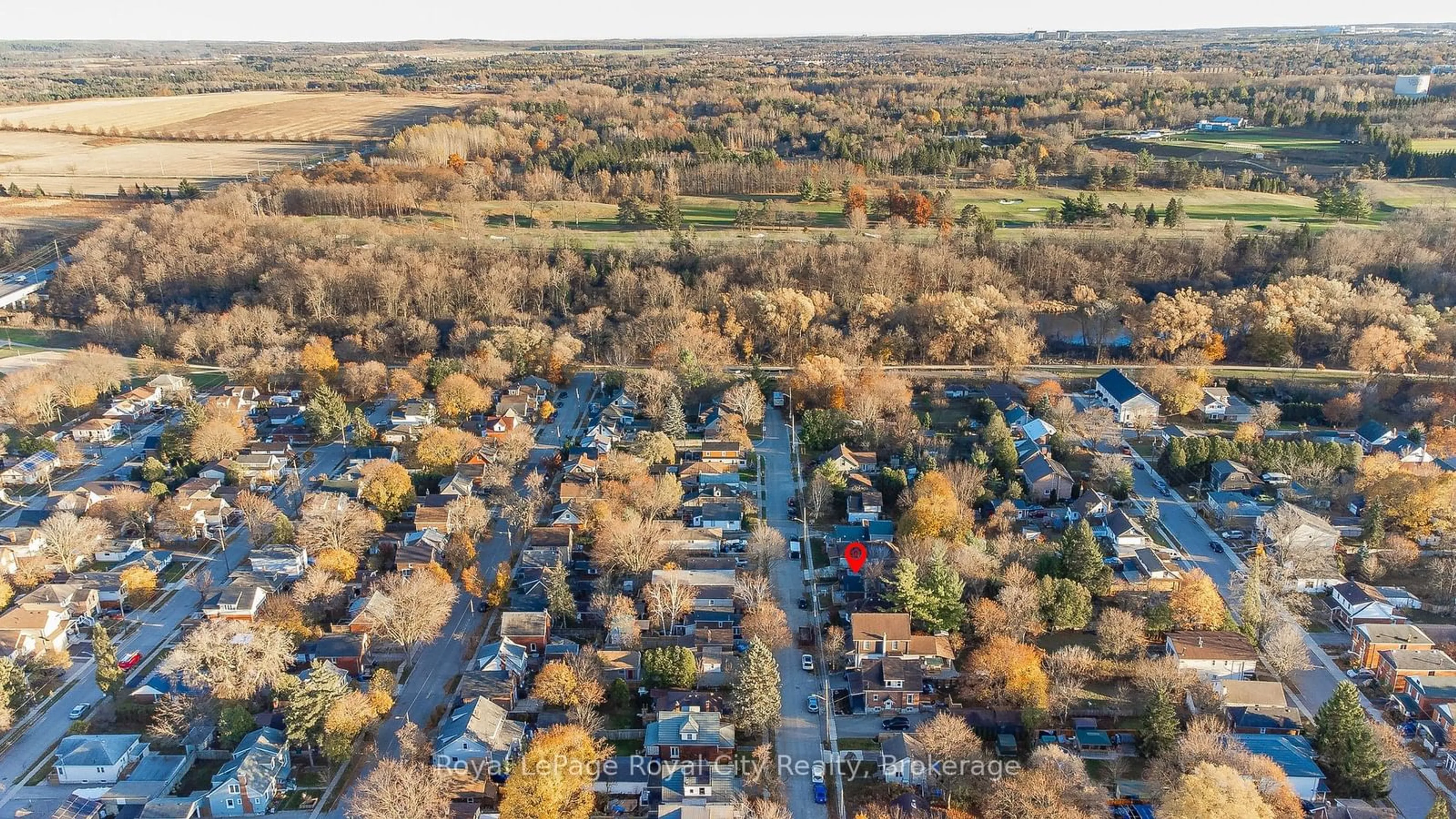 A pic from outside/outdoor area/front of a property/back of a property/a pic from drone, street for 67 HAYES Ave, Guelph Ontario N1E 5V7