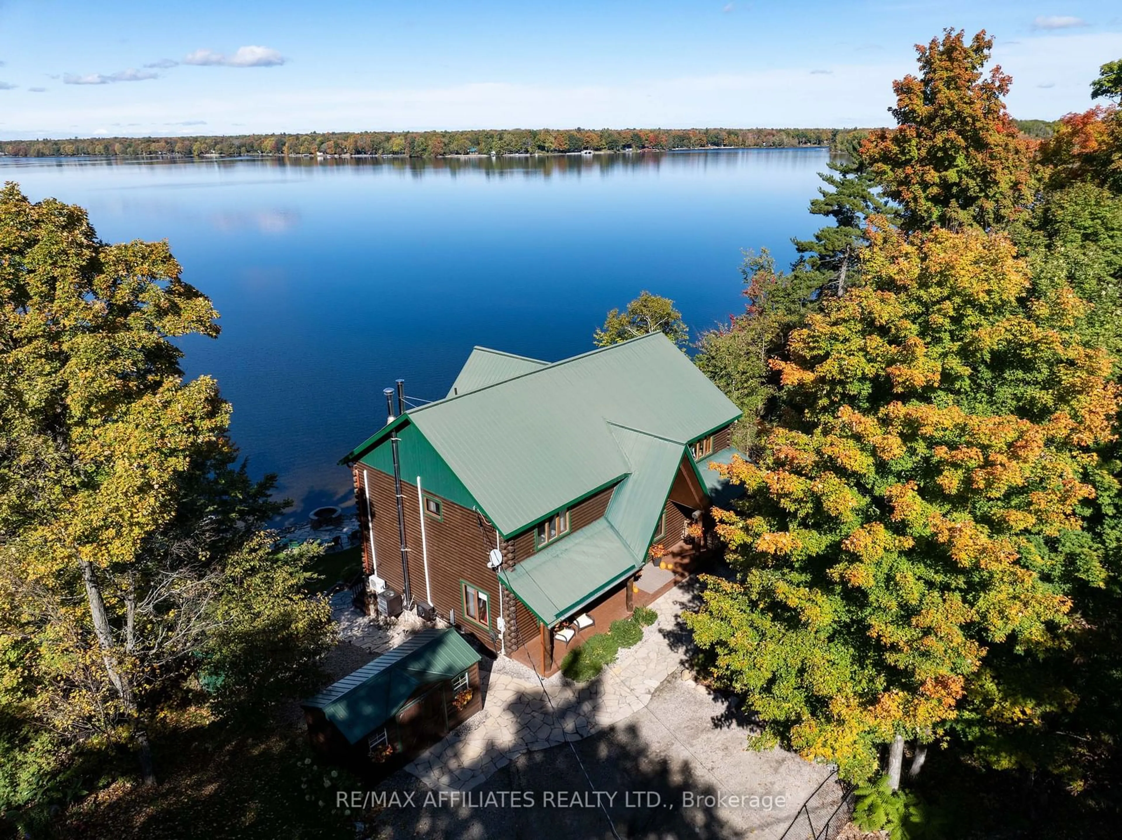 A pic from outside/outdoor area/front of a property/back of a property/a pic from drone, water/lake/river/ocean view for 122 Red Rock Bay Rd, Drummond/North Elmsley Ontario K7H 3C8