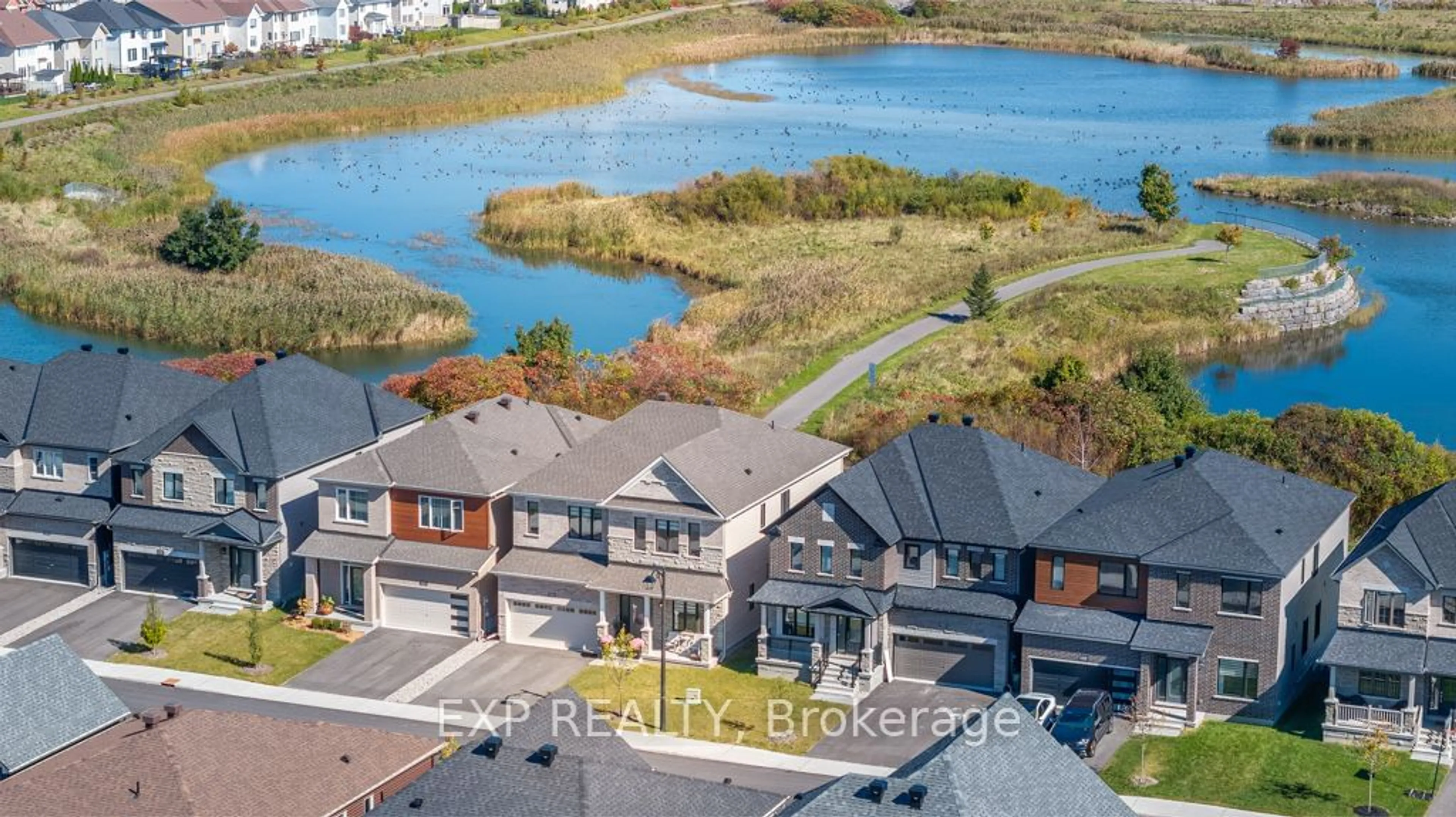 A pic from outside/outdoor area/front of a property/back of a property/a pic from drone, water/lake/river/ocean view for 924 Lakeridge Dr, Orleans - Cumberland and Area Ontario K4A 5N8