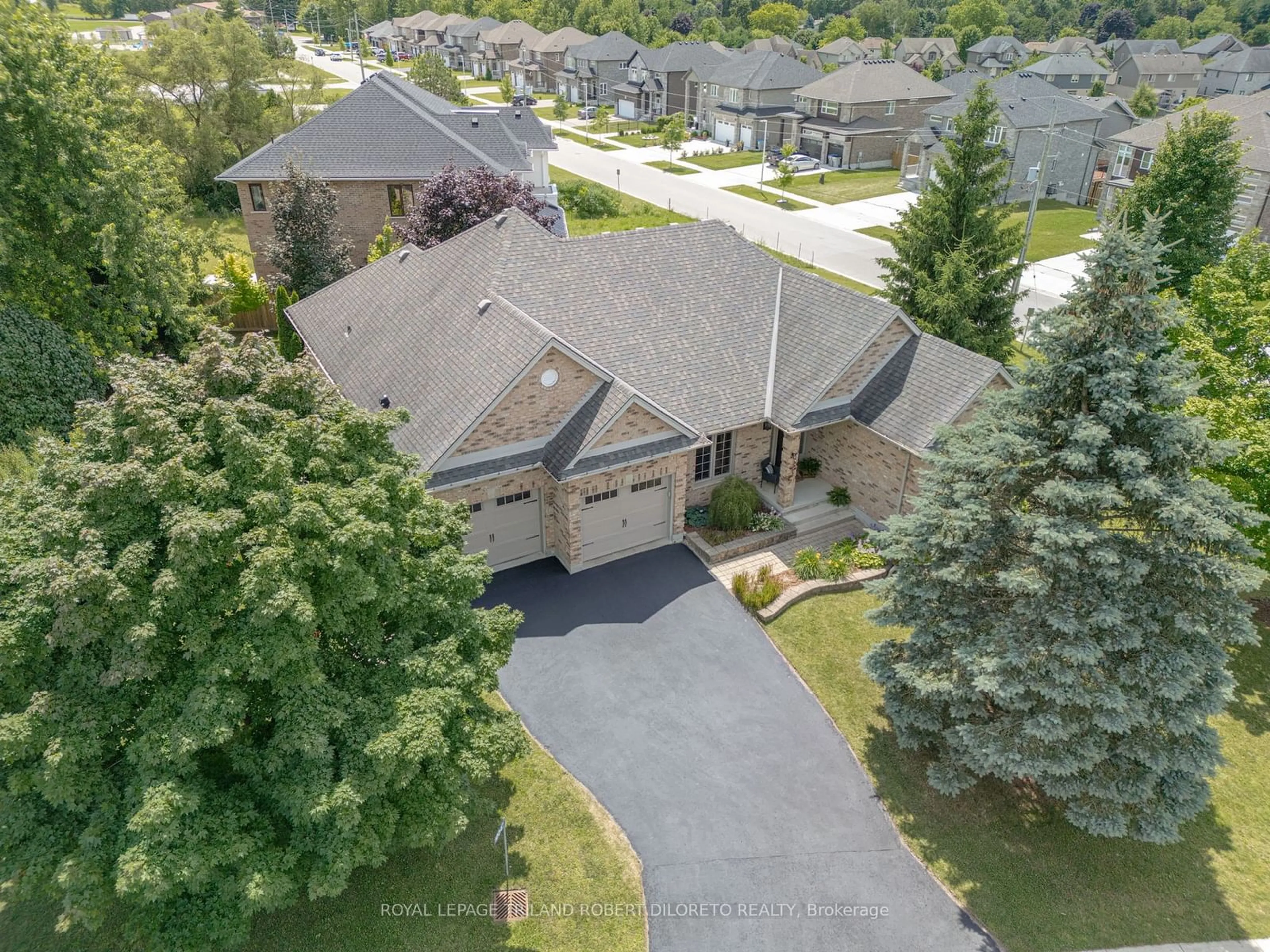 A pic from outside/outdoor area/front of a property/back of a property/a pic from drone, street for 10047 Oxbow Dr, Middlesex Centre Ontario N0L 1R0