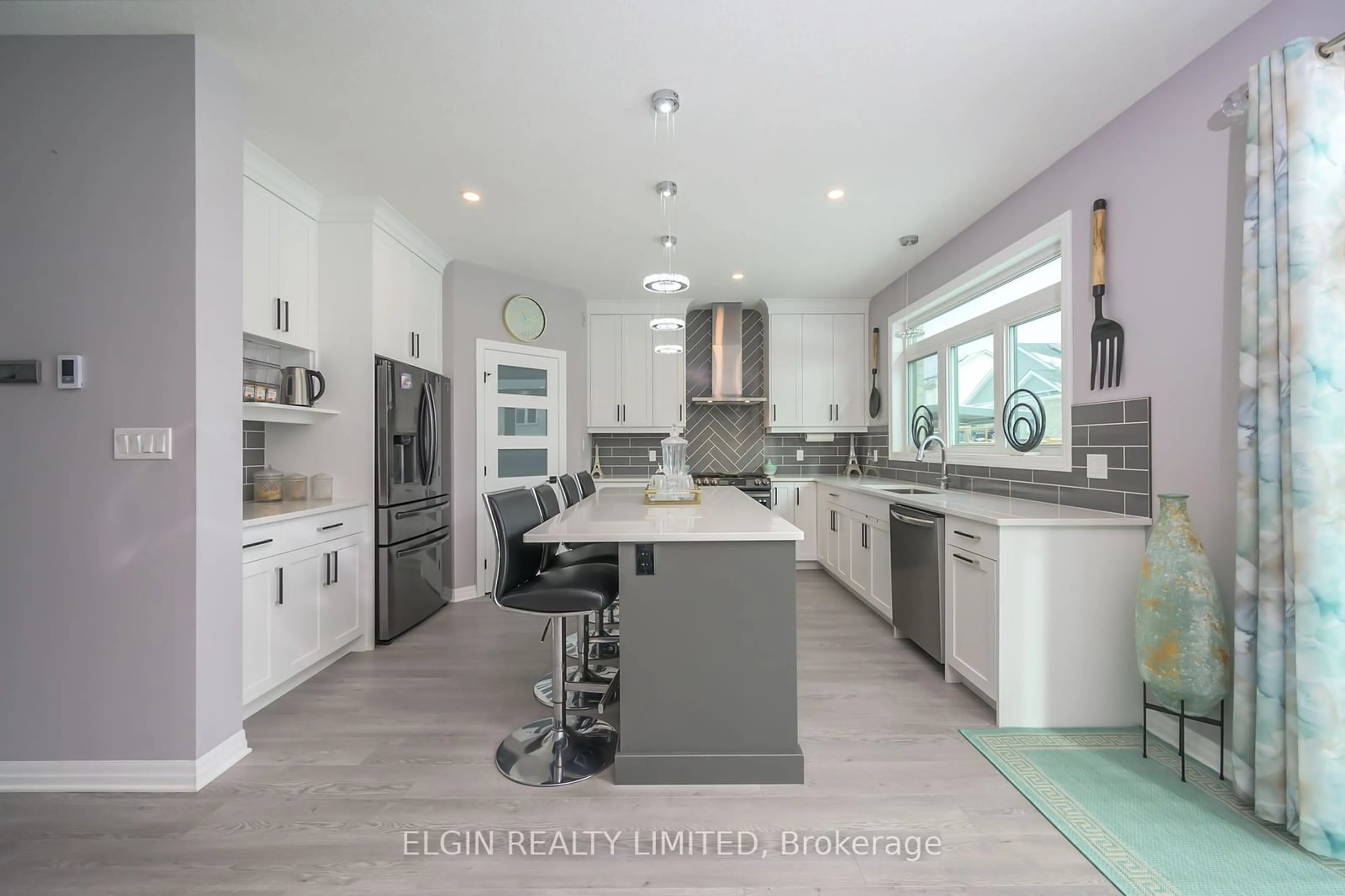 Open concept kitchen, ceramic/tile floor for 48 Snowy Owl Tr, Central Elgin Ontario N5R 0M7