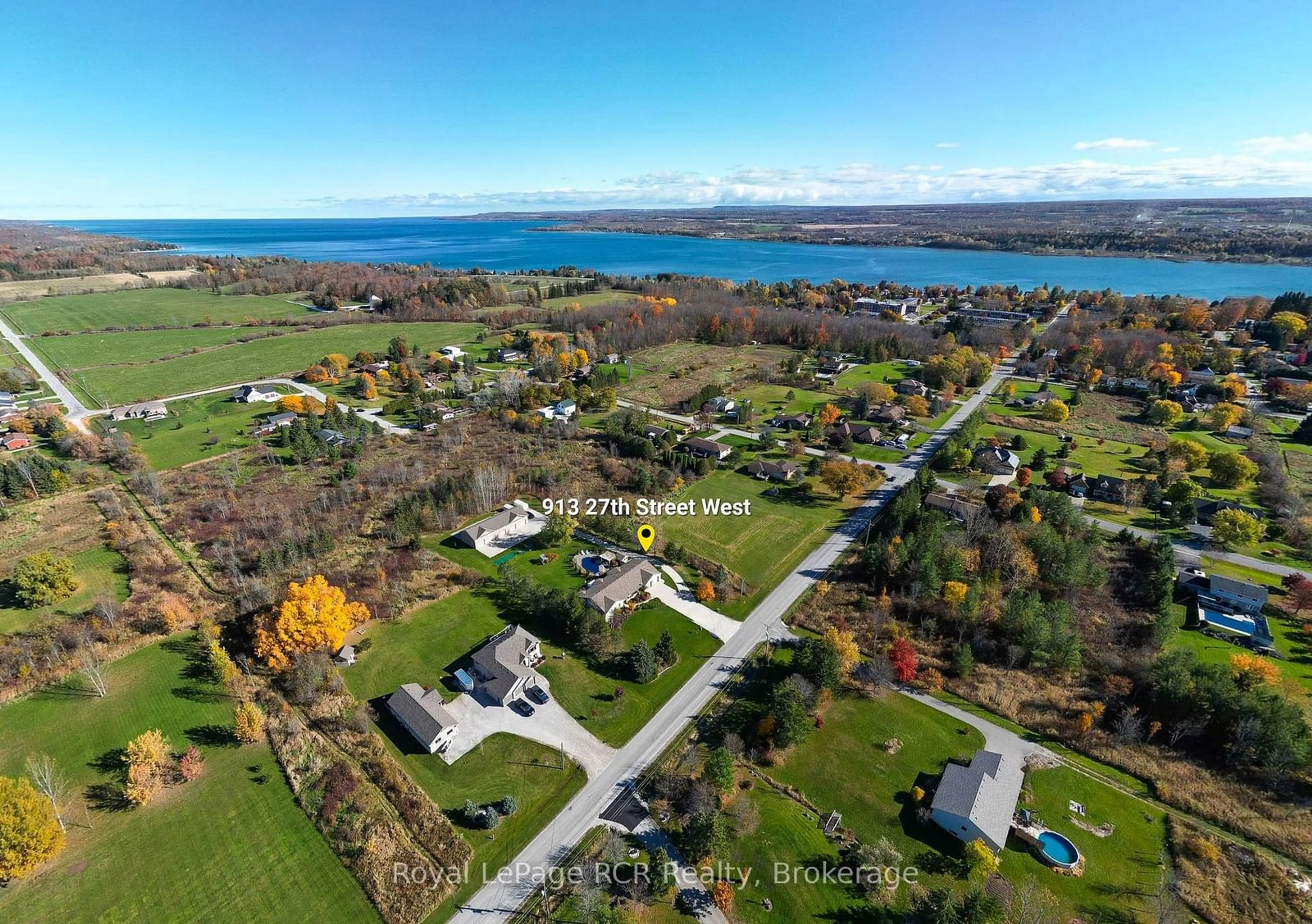 A pic from outside/outdoor area/front of a property/back of a property/a pic from drone, water/lake/river/ocean view for 913 27th St, Georgian Bluffs Ontario N4K 5N4