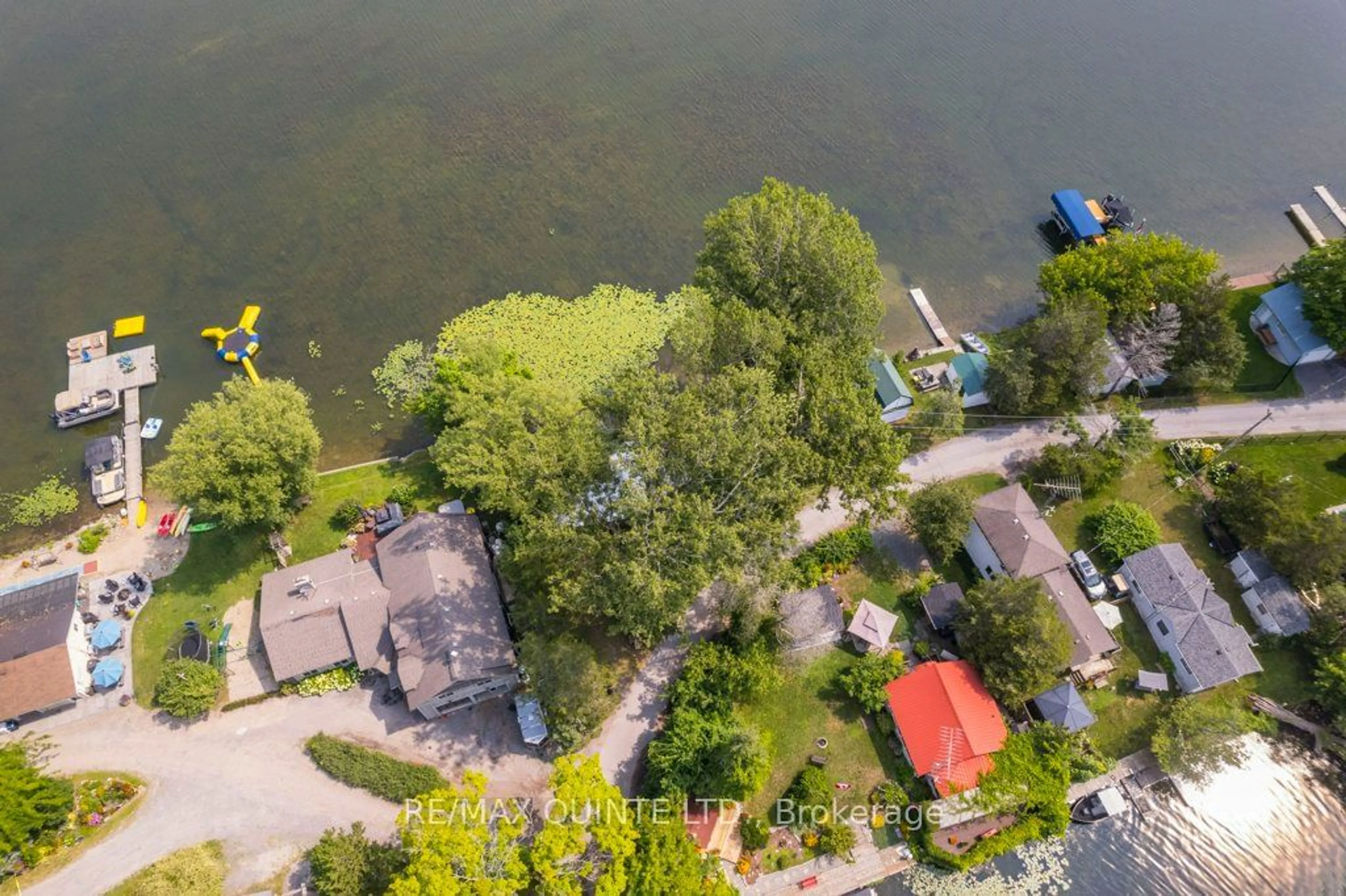 A pic from outside/outdoor area/front of a property/back of a property/a pic from drone, water/lake/river/ocean view for 142 Outlet Rd, Prince Edward County Ontario K0K 1P0