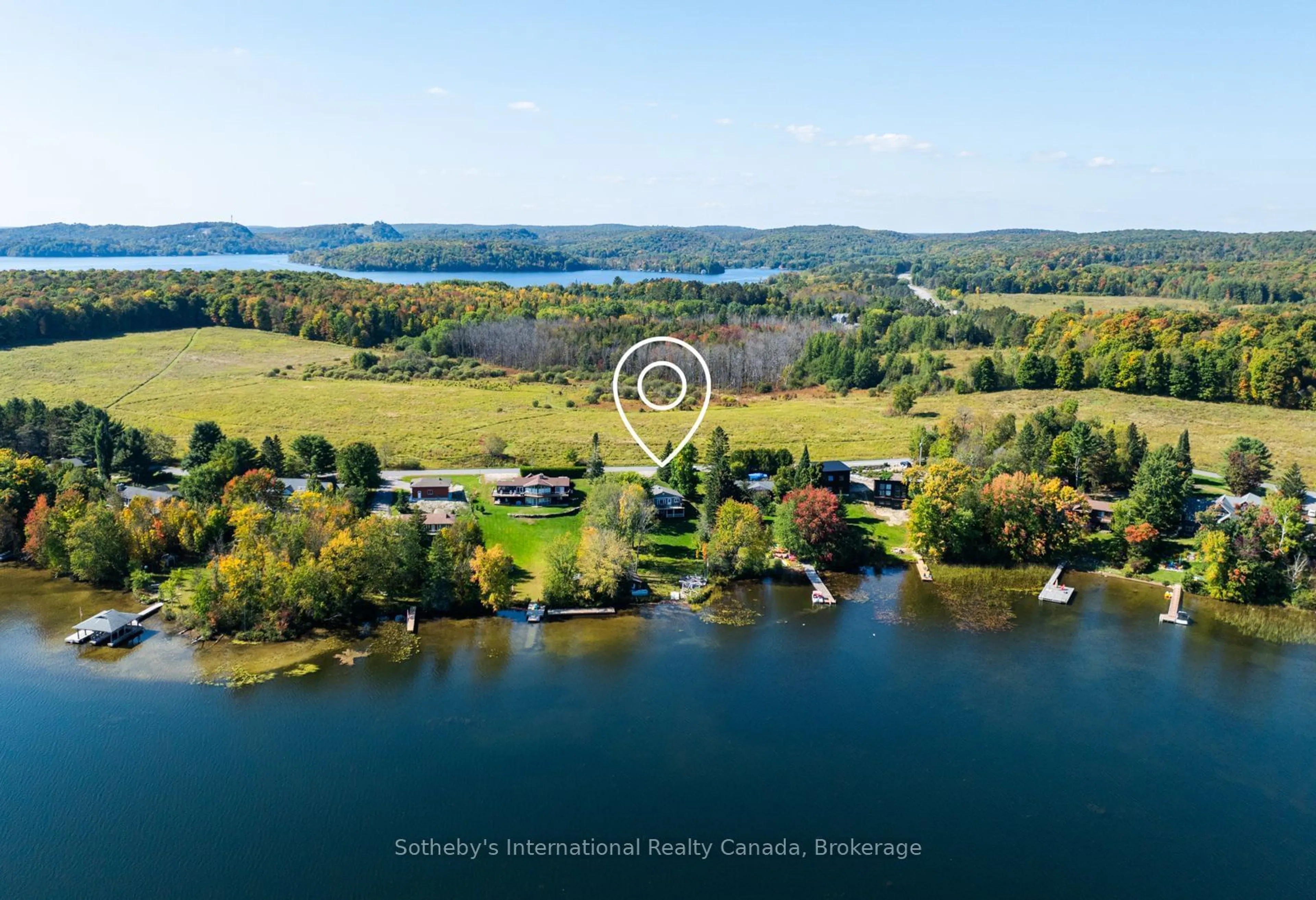 A pic from outside/outdoor area/front of a property/back of a property/a pic from drone, water/lake/river/ocean view for 1111 Maplehurst Dr, Lake of Bays Ontario P1H 2J6