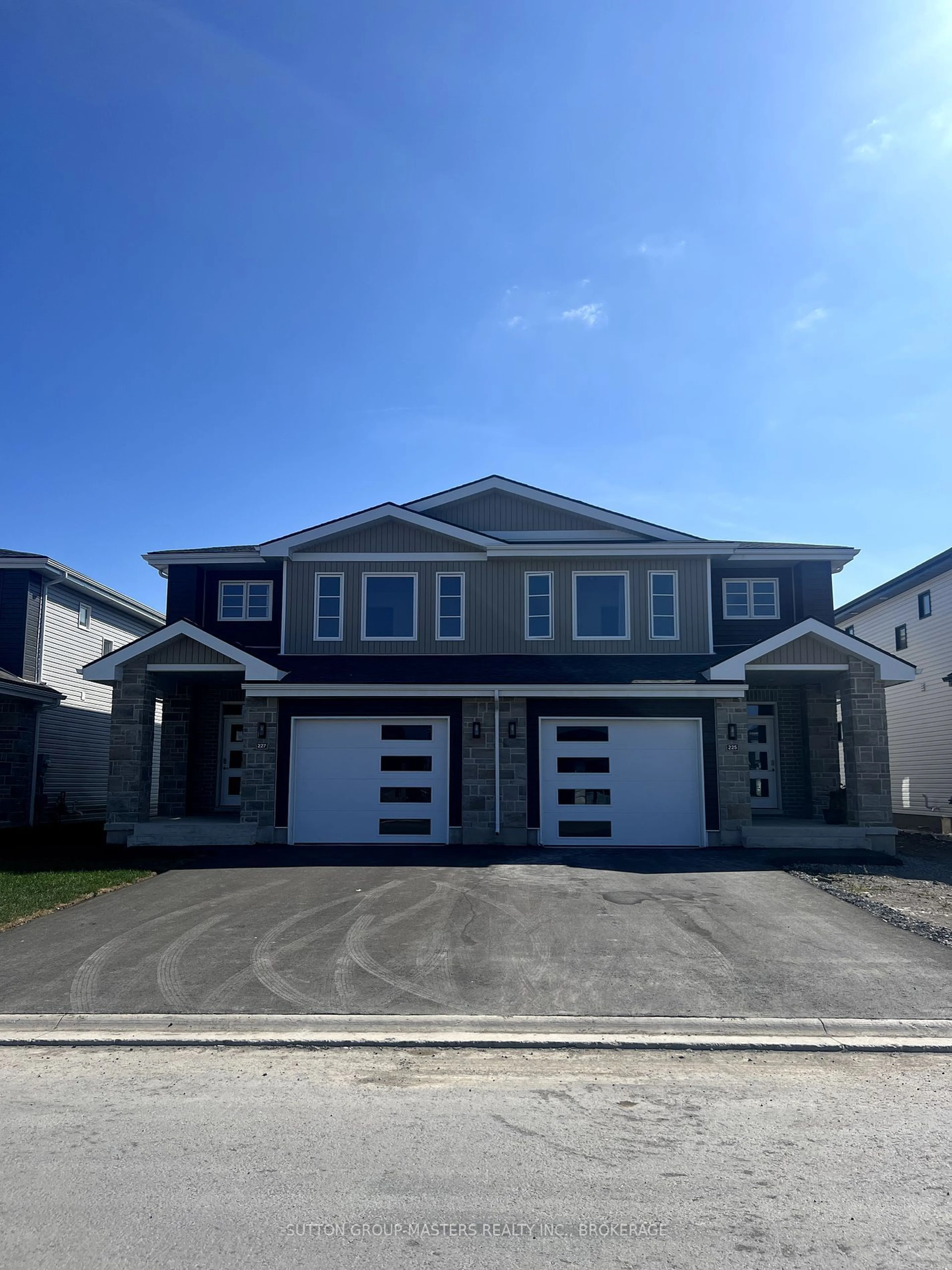 Home with vinyl exterior material, street for 201 Superior Dr, Loyalist Ontario K7N 0E9