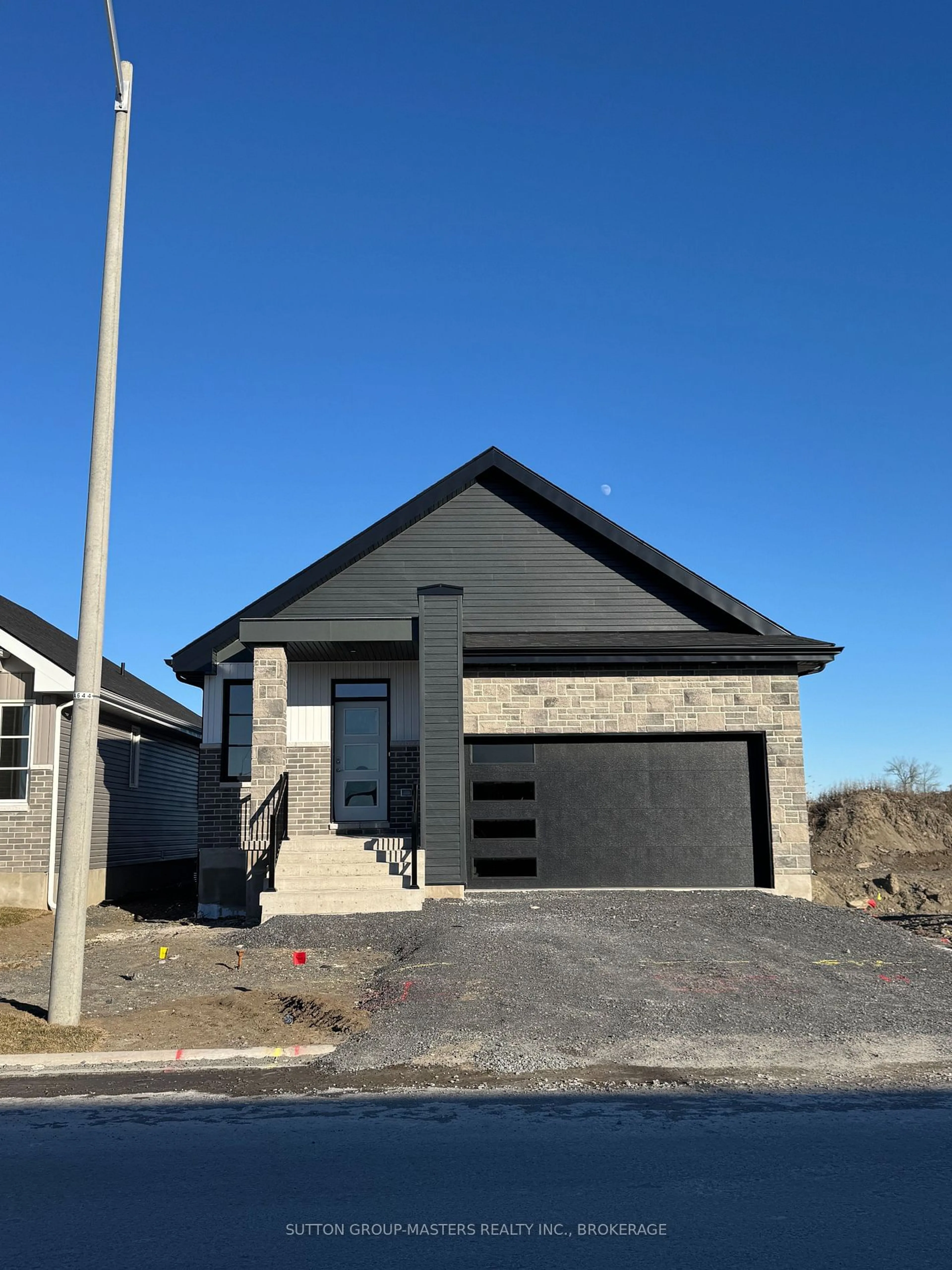 Home with vinyl exterior material, street for 257 Pratt Dr, Loyalist Ontario K7N 0E8