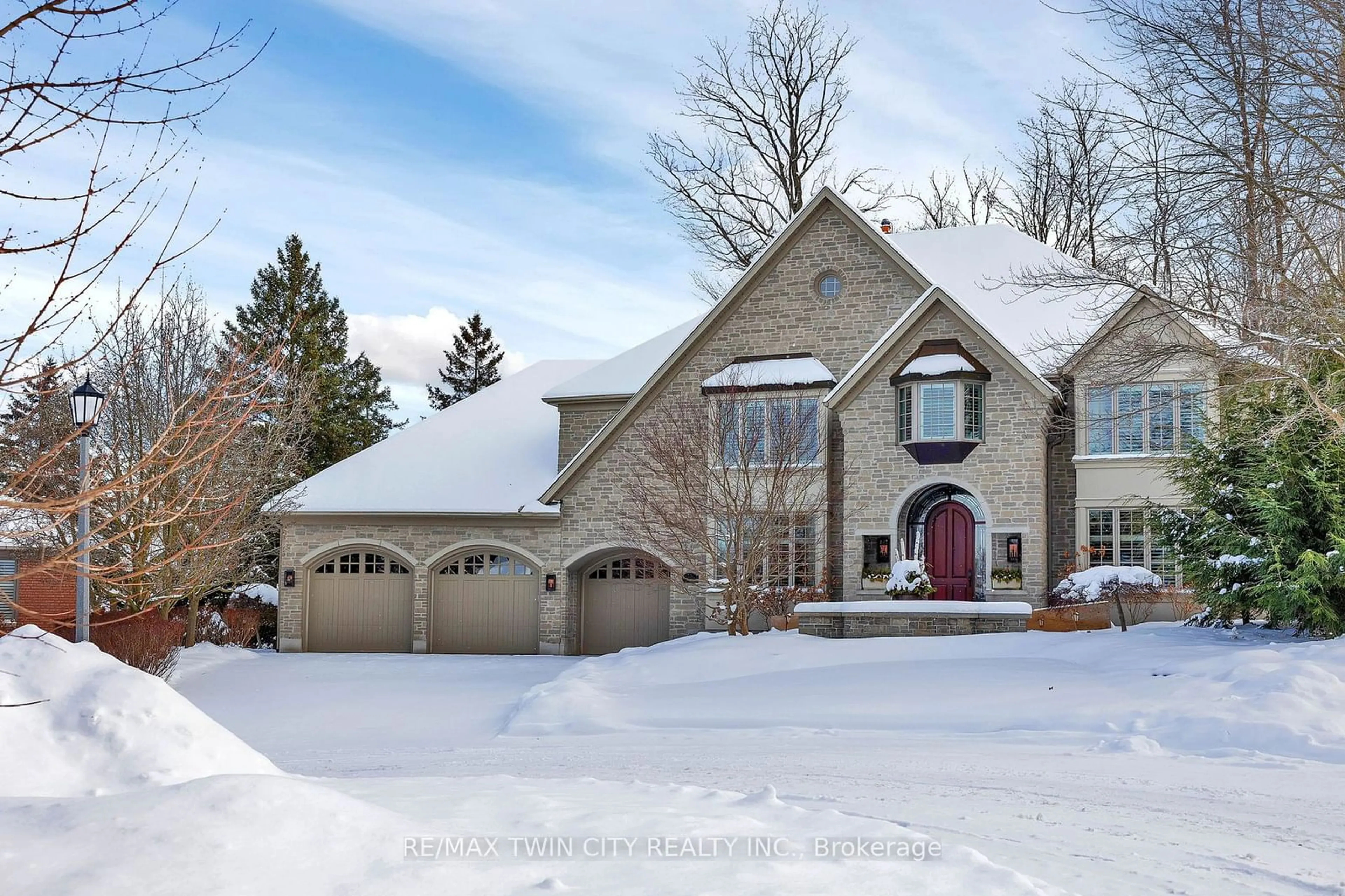 Home with brick exterior material, street for 310 BUSHWOOD Crt, Waterloo Ontario N2T 2E6