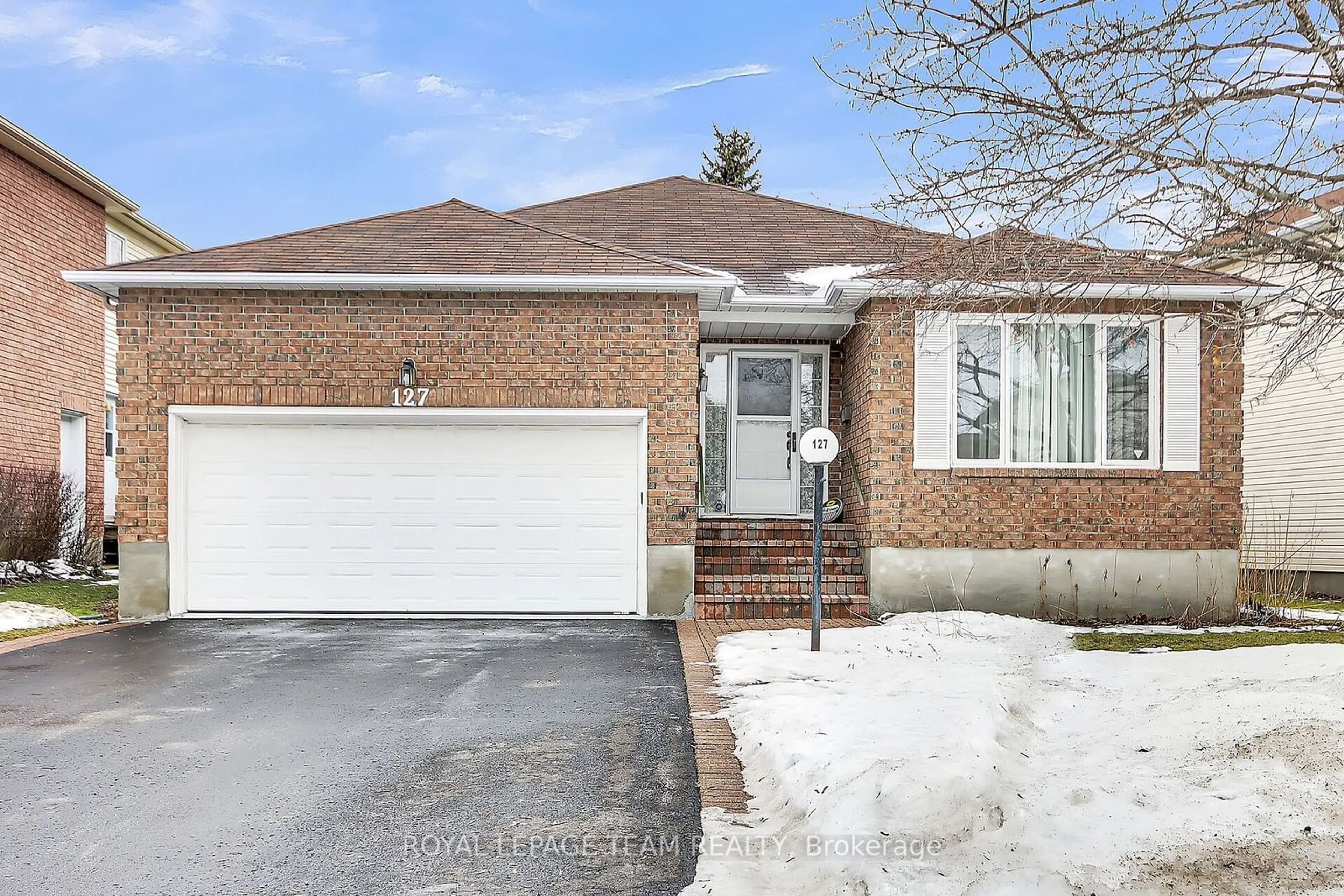 Home with brick exterior material, street for 127 Palomino Dr, Kanata Ontario K2M 1P5