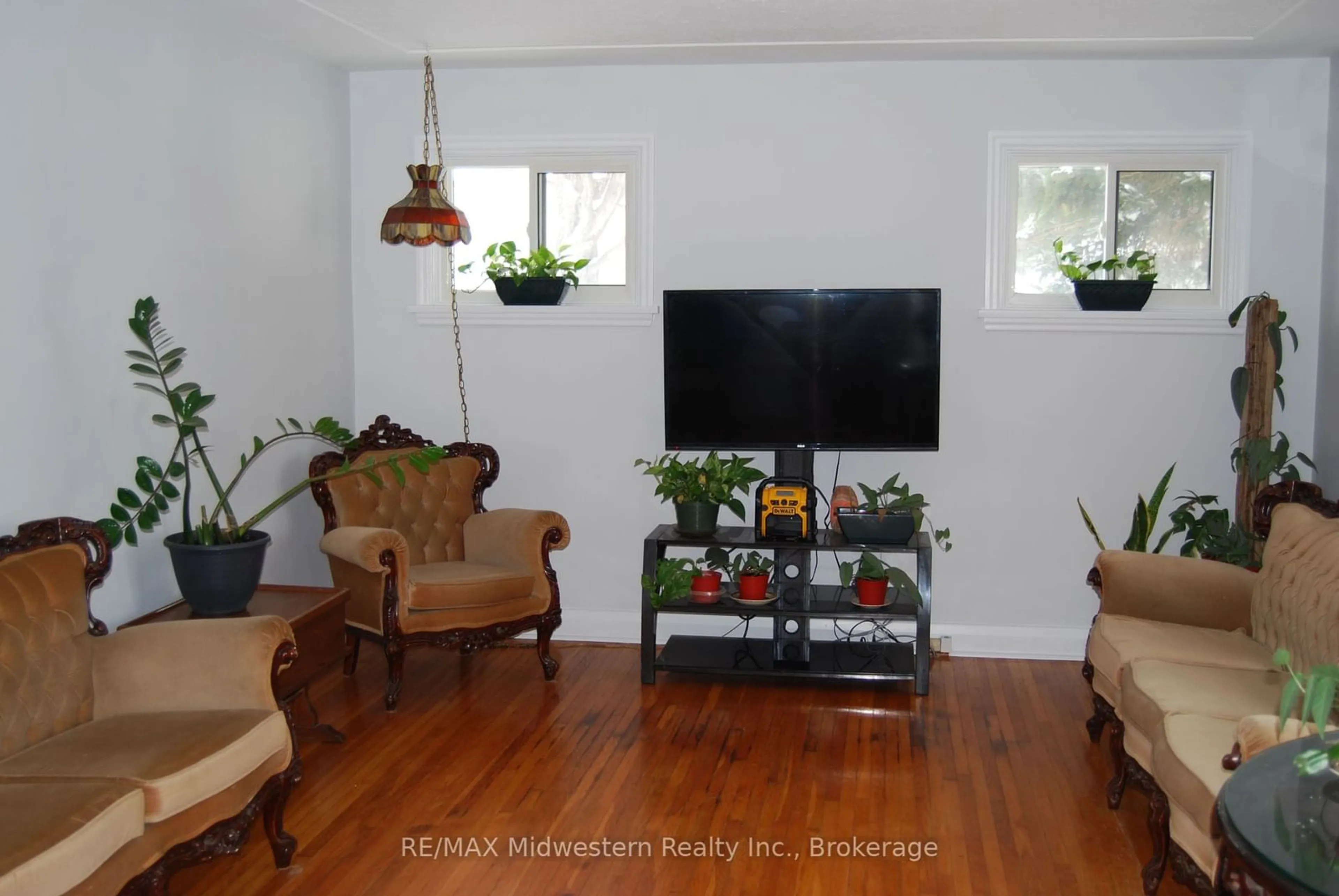 Living room with furniture, wood/laminate floor for 281 Elora St, Minto Ontario N0G 1Z0