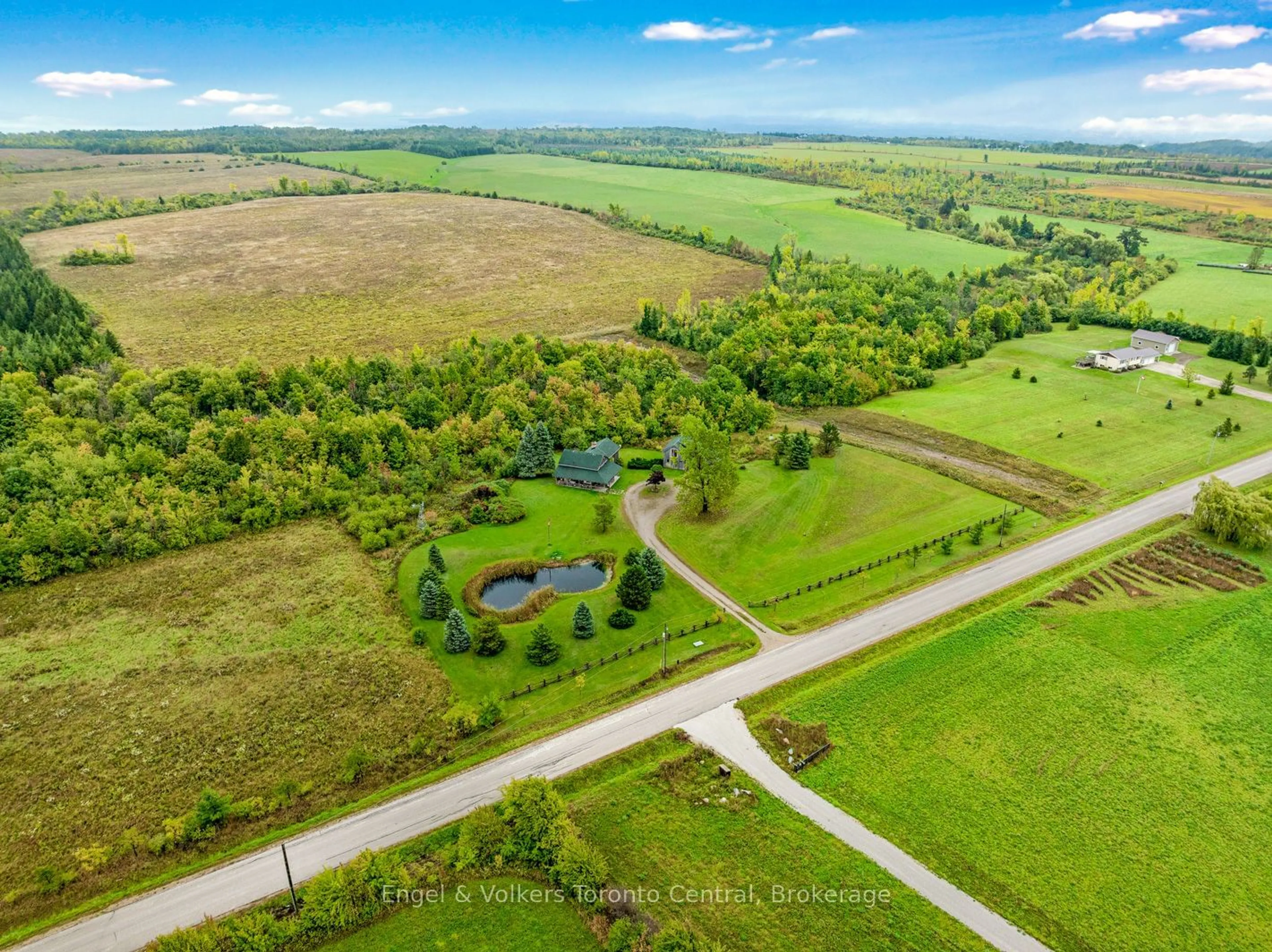 A pic from outside/outdoor area/front of a property/back of a property/a pic from drone, water/lake/river/ocean view for 317343 3RD Line, Meaford Ontario N4L 1W7