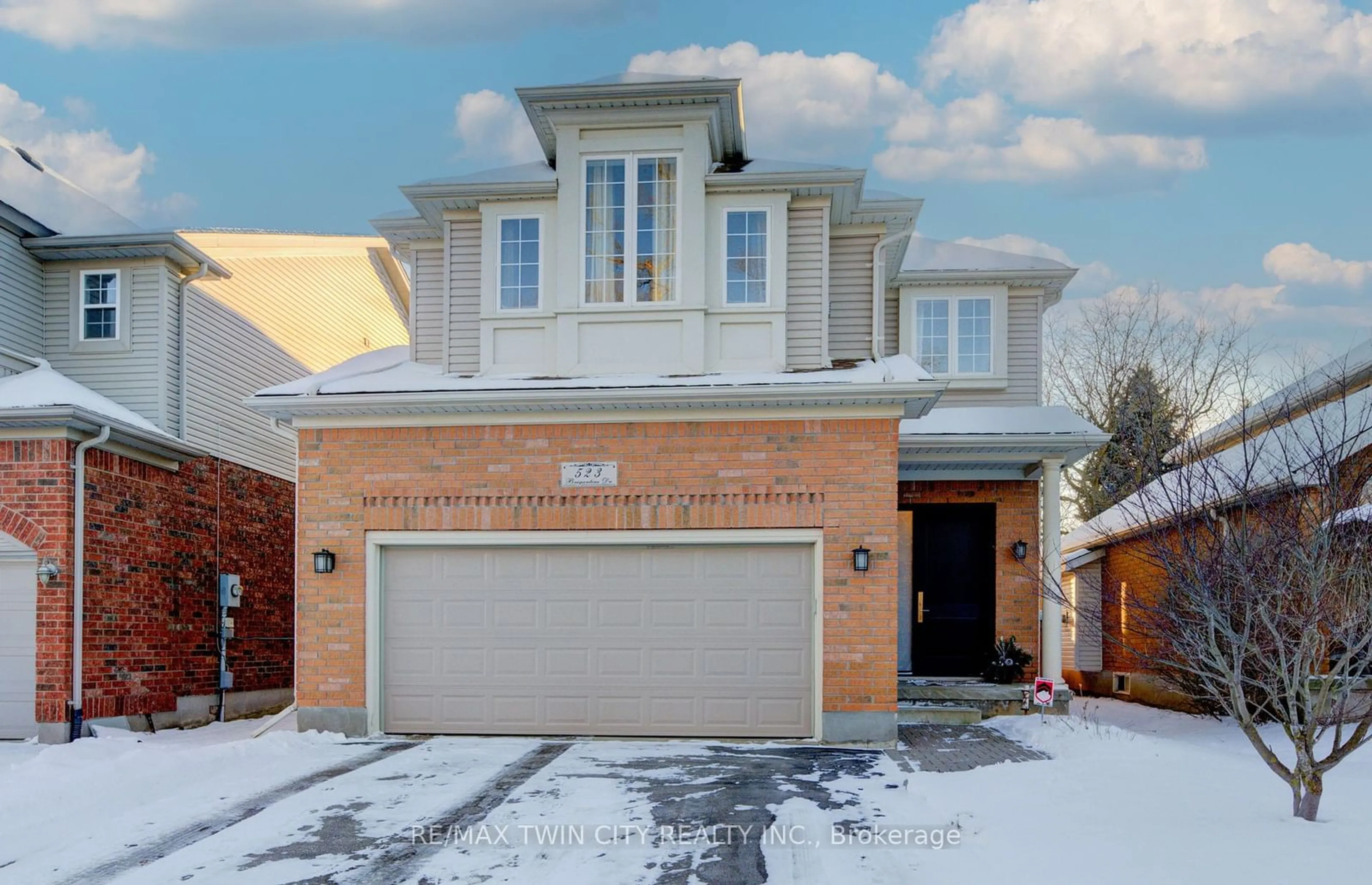 Home with brick exterior material, street for 523 Brigantine Dr, Waterloo Ontario N2K 4B7