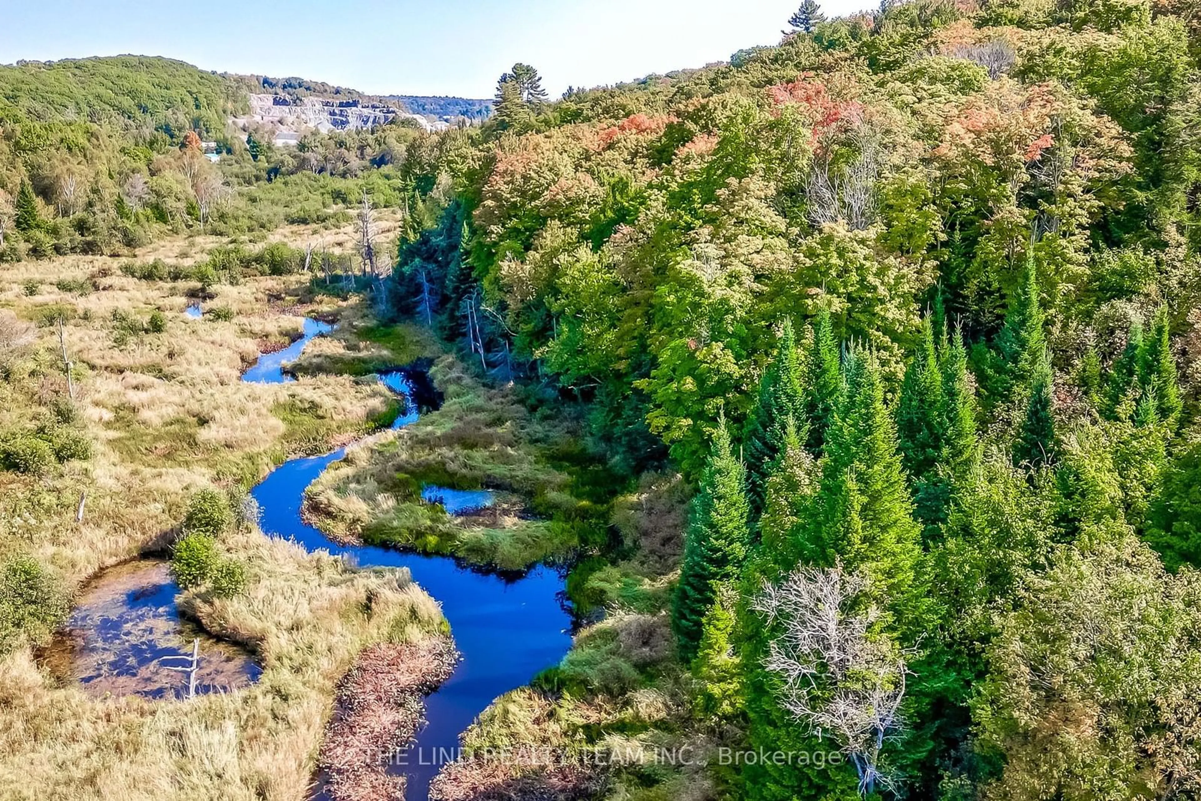 A pic from outside/outdoor area/front of a property/back of a property/a pic from drone, water/lake/river/ocean view for 949 Raymond Rd, Muskoka Lakes Ontario P0B 1M0