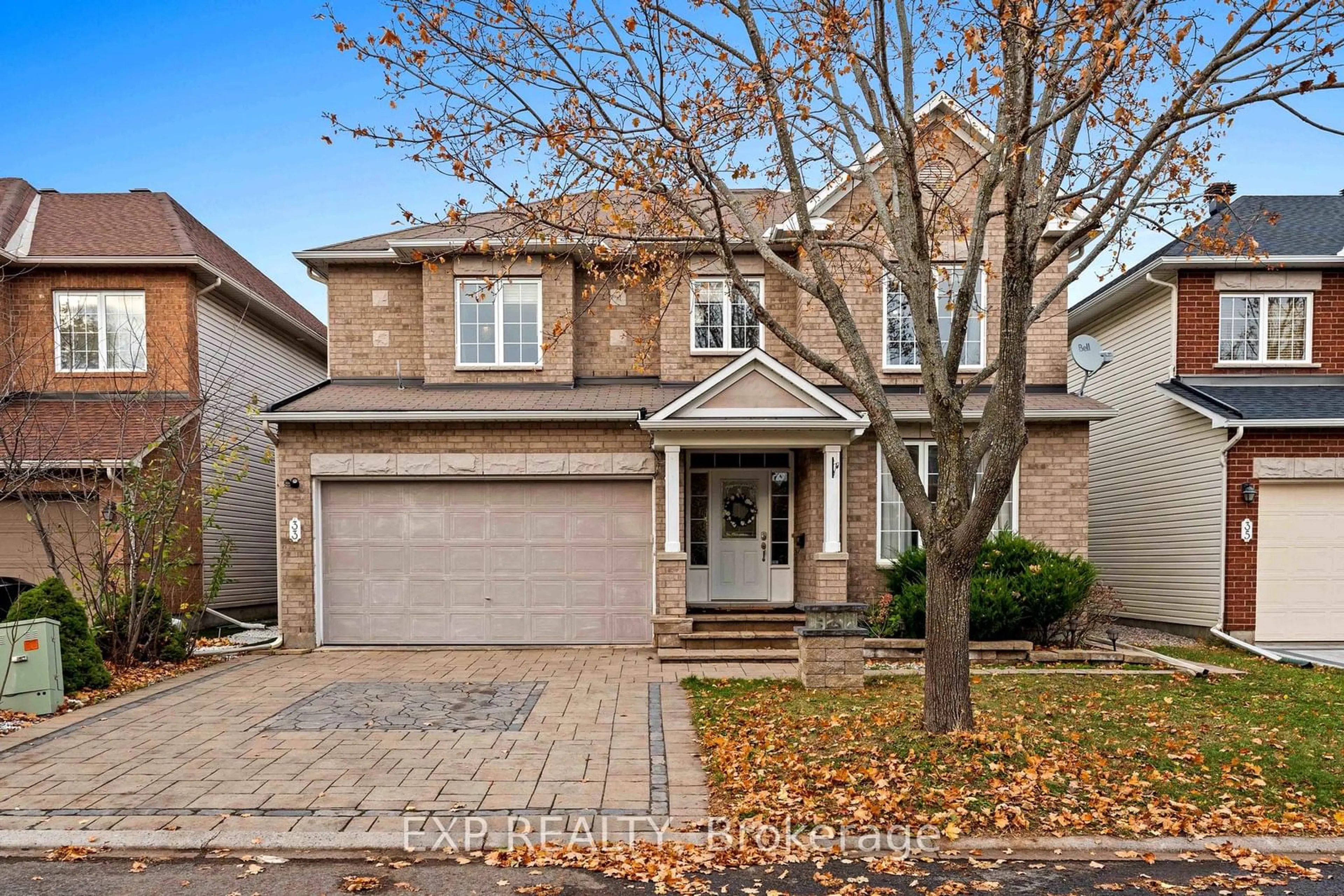 Home with brick exterior material, street for 33 Valencia St, Ottawa Ontario K2G 6T1