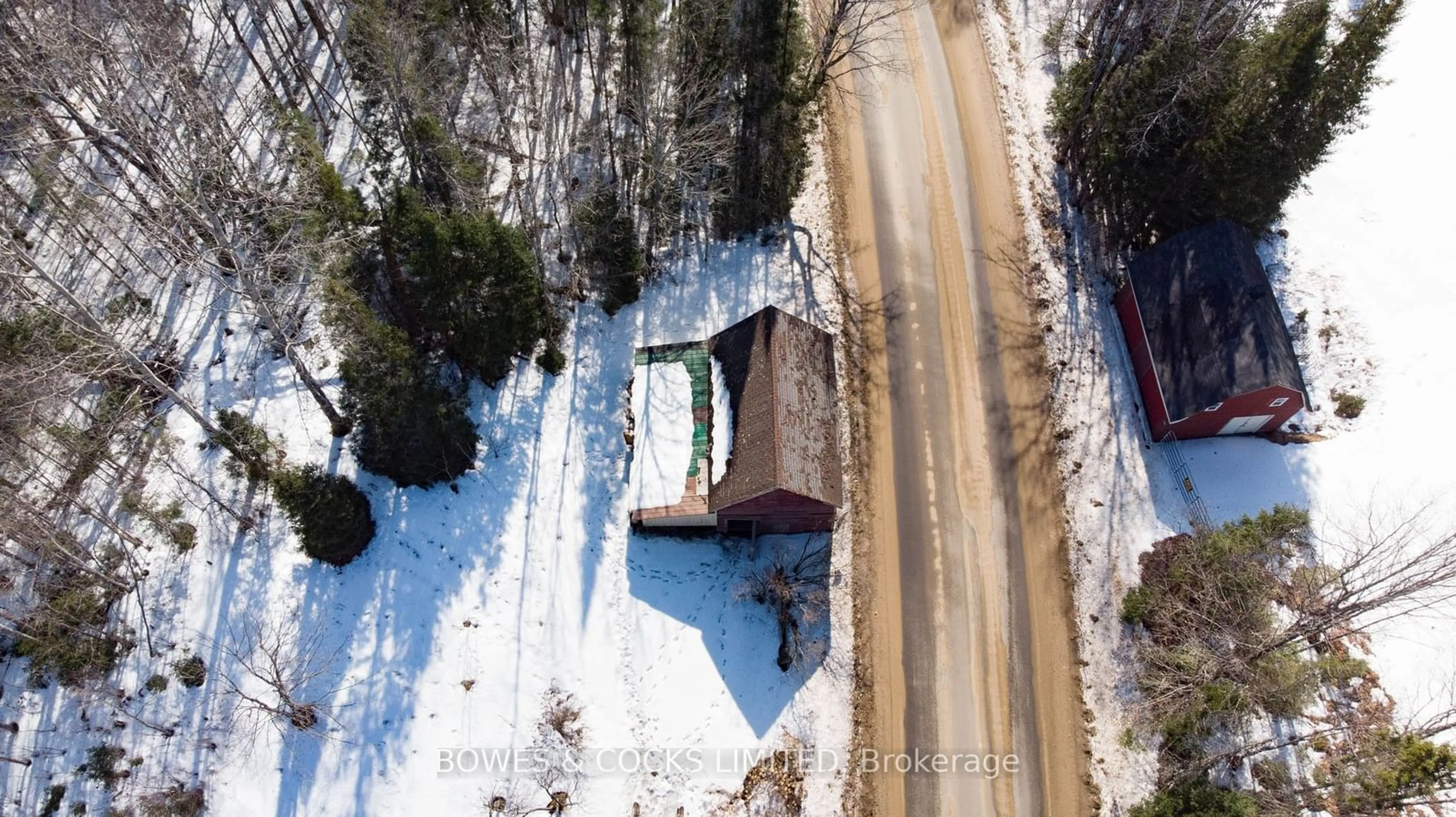 A pic from outside/outdoor area/front of a property/back of a property/a pic from drone, street for 702 Hybla Rd, Hastings Highlands Ontario K0L 1C0