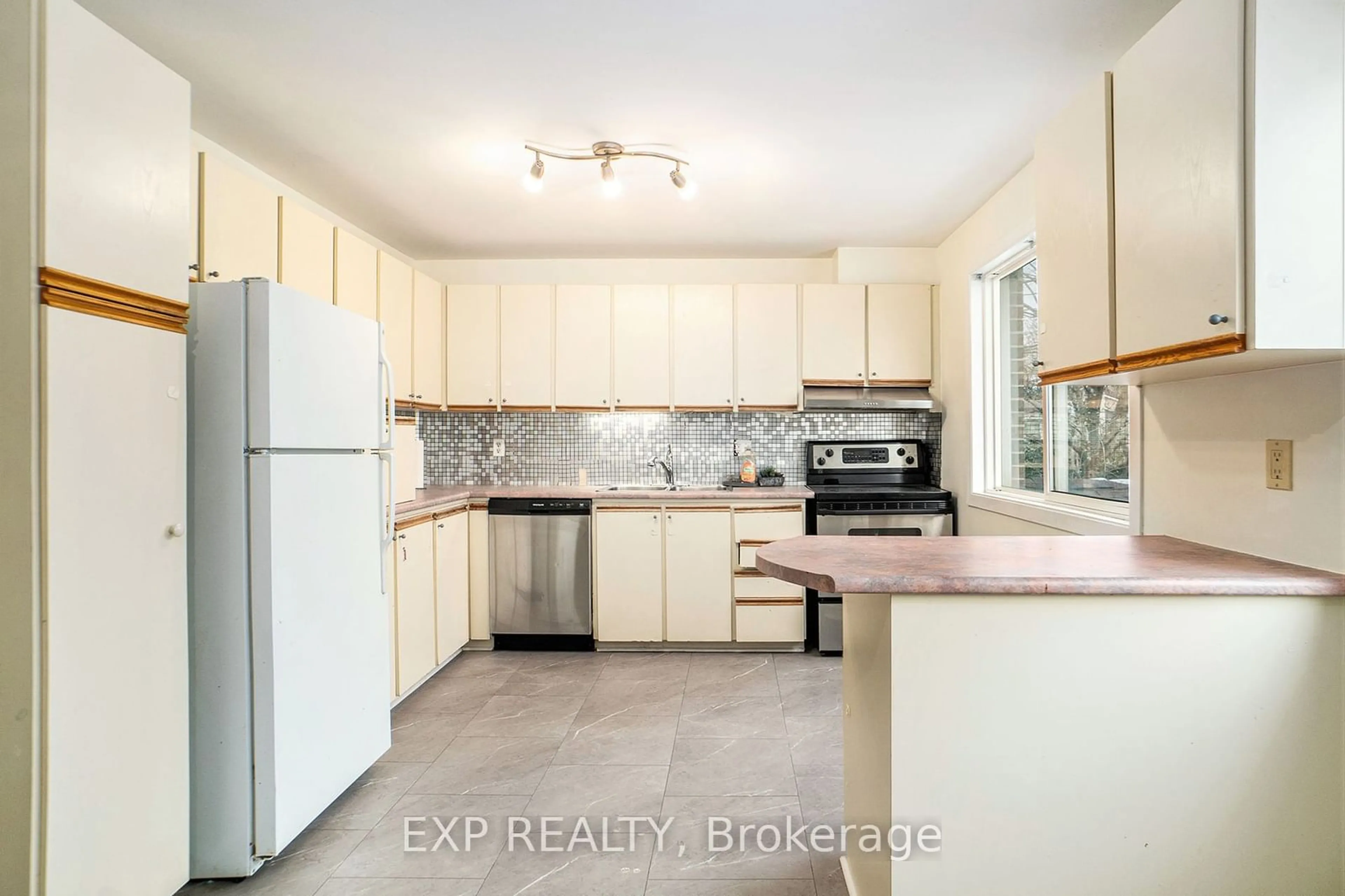 Standard kitchen, ceramic/tile floor for 6911 Du Bois Ave, Orleans - Convent Glen and Area Ontario K1C 5L3