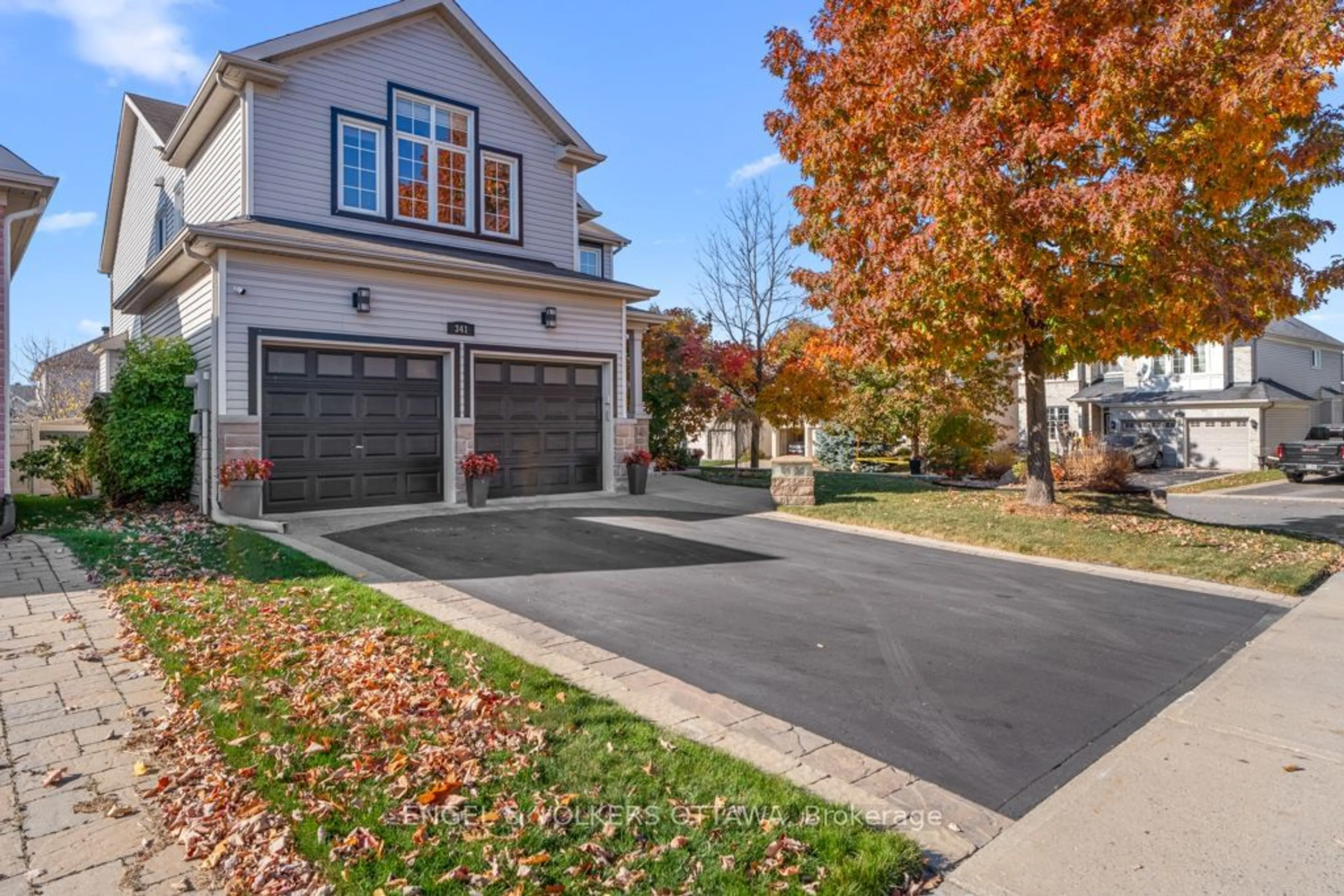 Home with brick exterior material, street for 341 SHADEHILL Cres, Barrhaven Ontario K2J 0L6