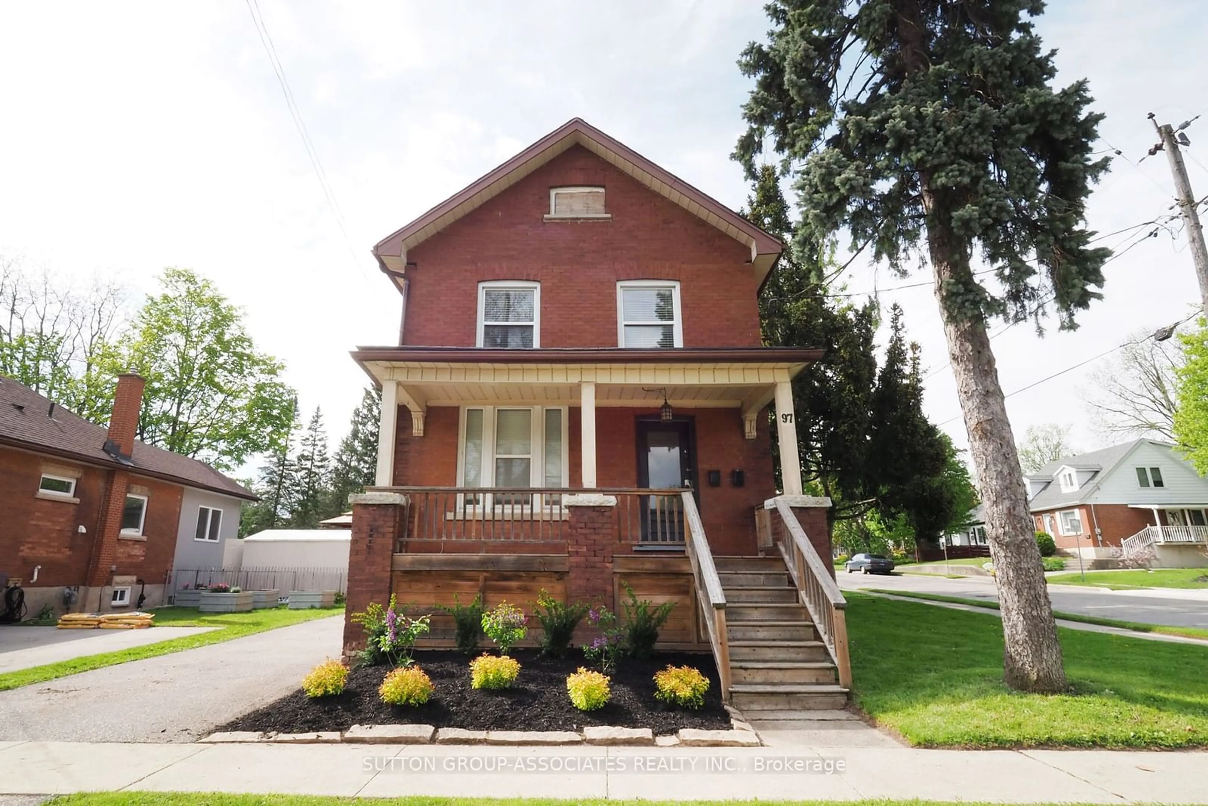 Home with brick exterior material, street for 97 Division St, Guelph Ontario N1H 1R7