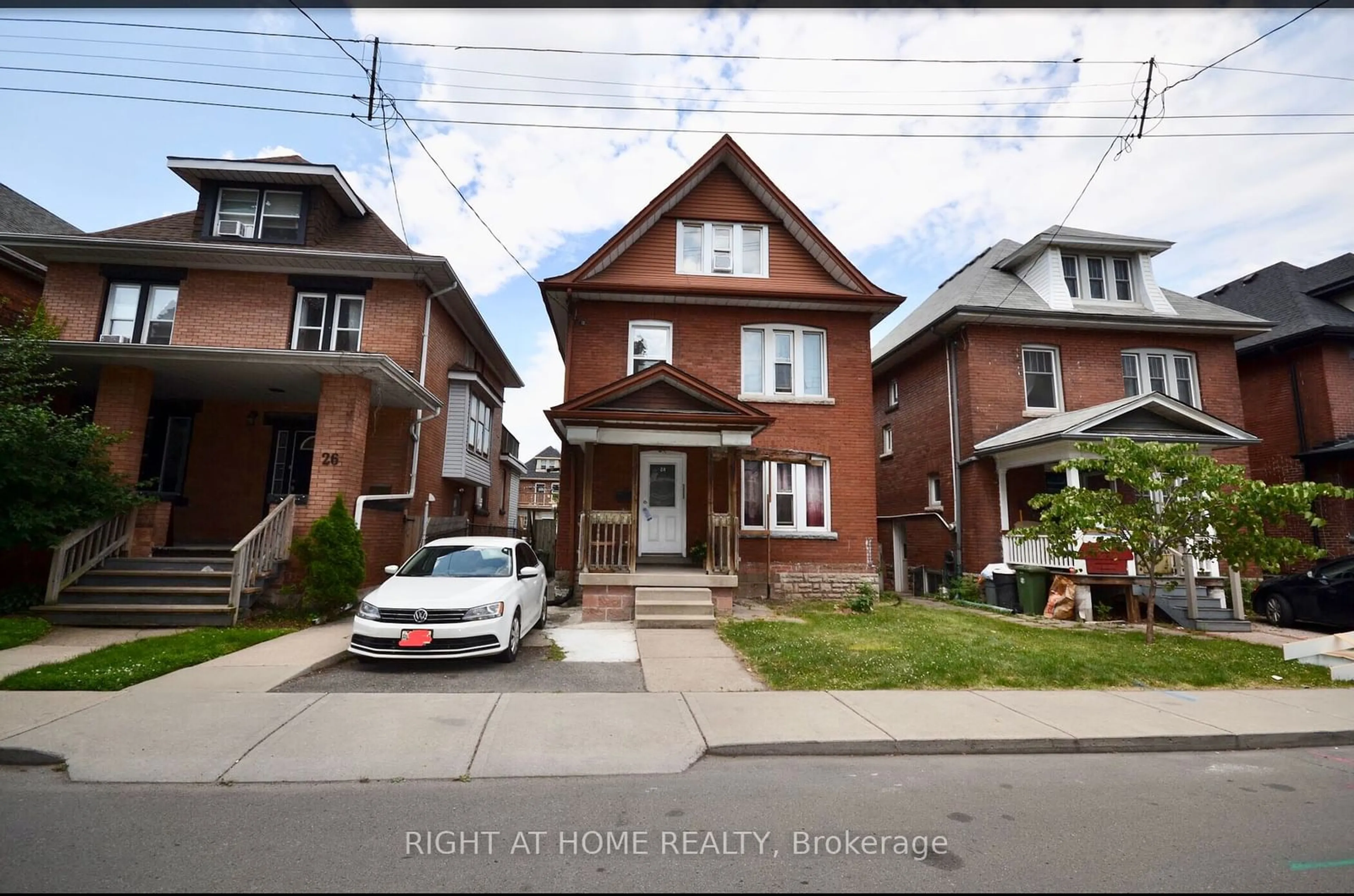 Home with brick exterior material, street for 24 Spadina Ave, Hamilton Ontario L8M 2W9