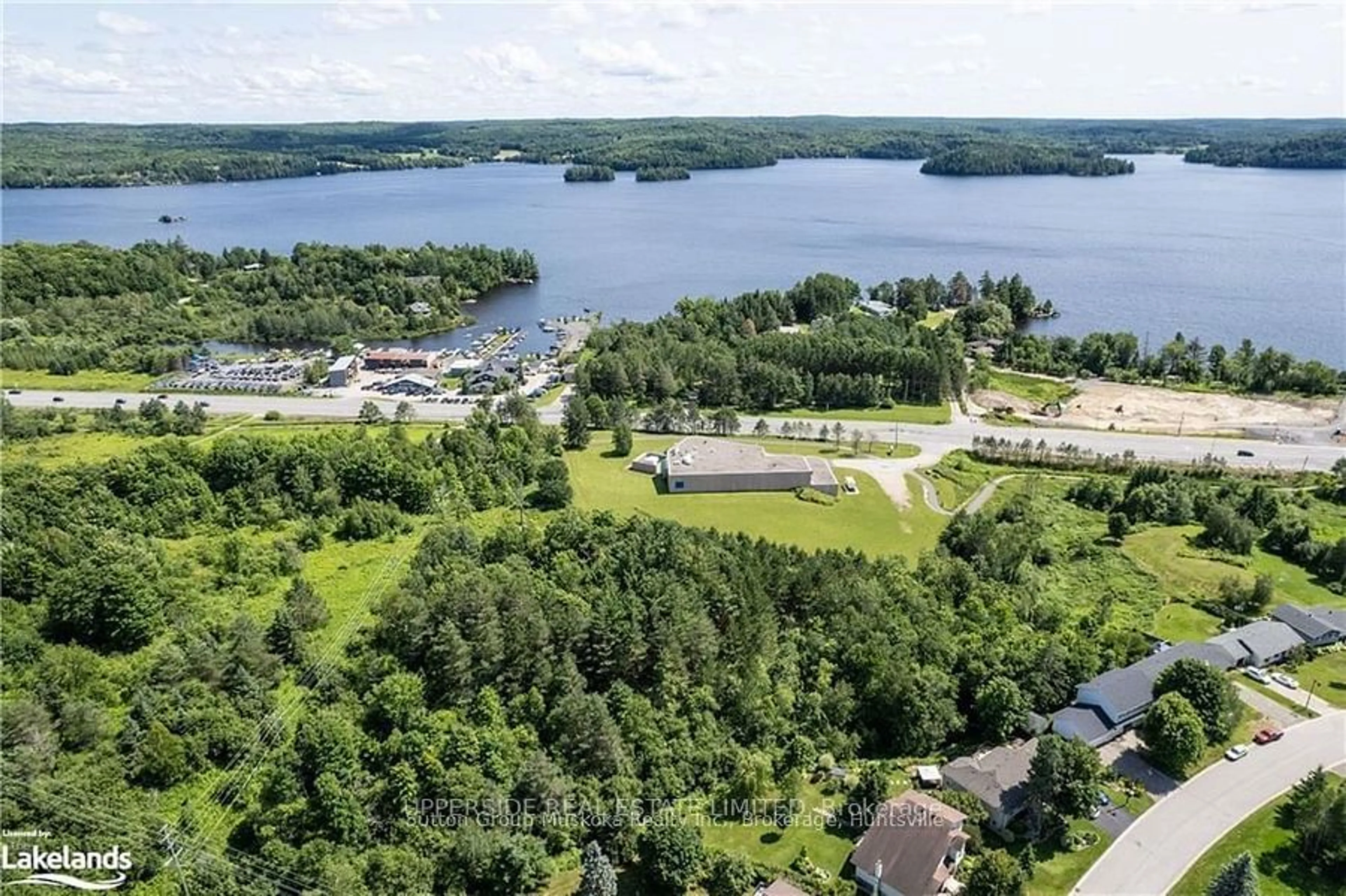 A pic from outside/outdoor area/front of a property/back of a property/a pic from drone, water/lake/river/ocean view for 30 GLENWOOD Dr, Huntsville Ontario P1H 1B6