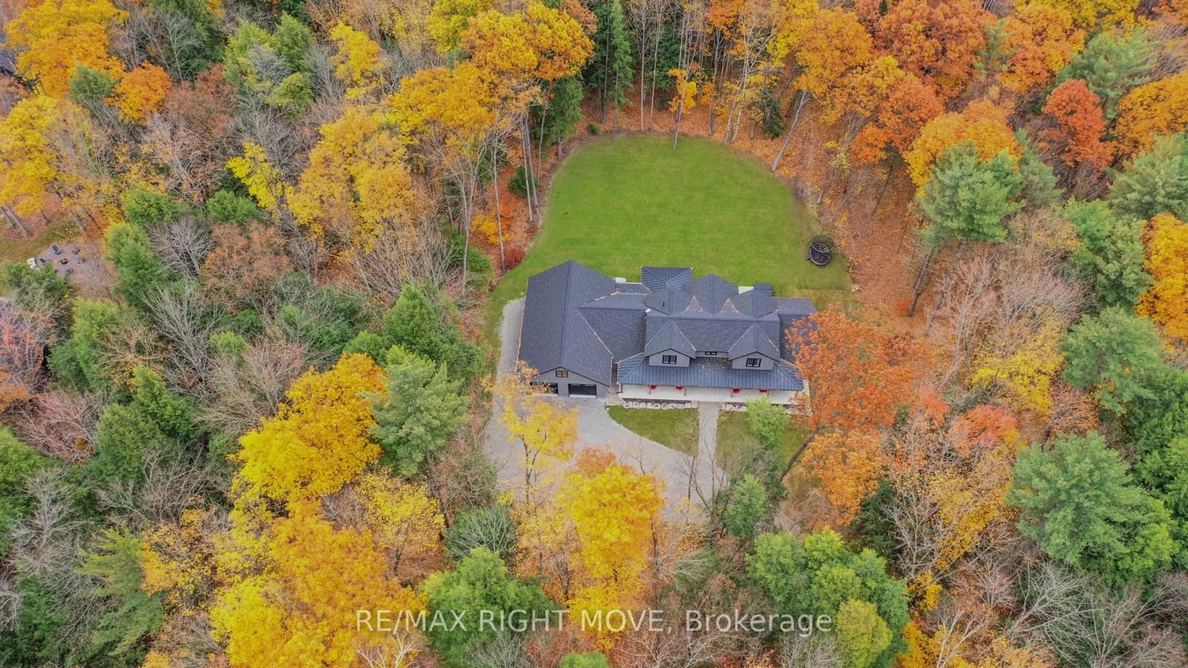 A pic from outside/outdoor area/front of a property/back of a property/a pic from drone, forest/trees view for 1025 Davis Dr, Gravenhurst Ontario P0E 1N0