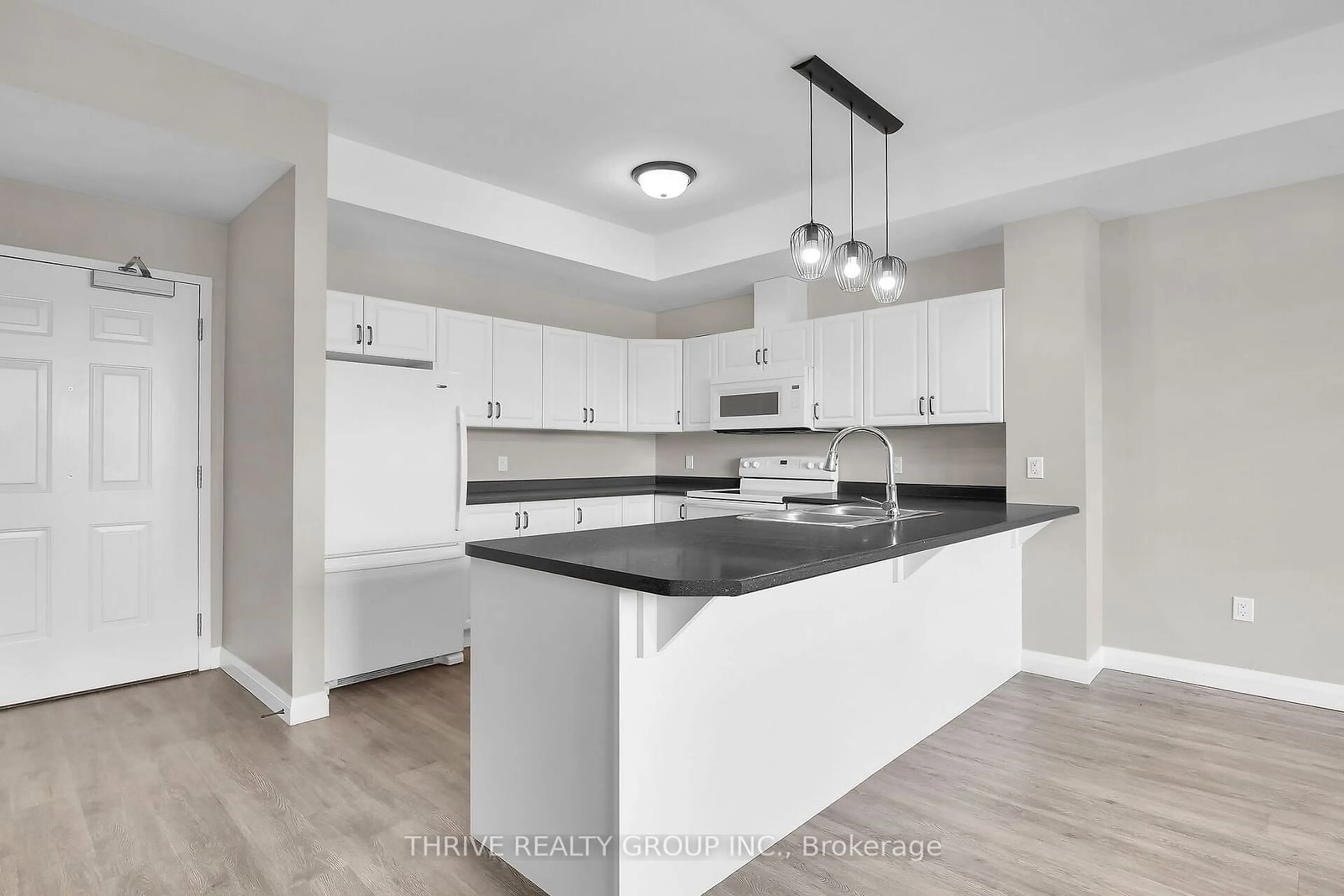 Open concept kitchen, unknown for 263 Butler St #103, Lucan Biddulph Ontario N0M 2J0