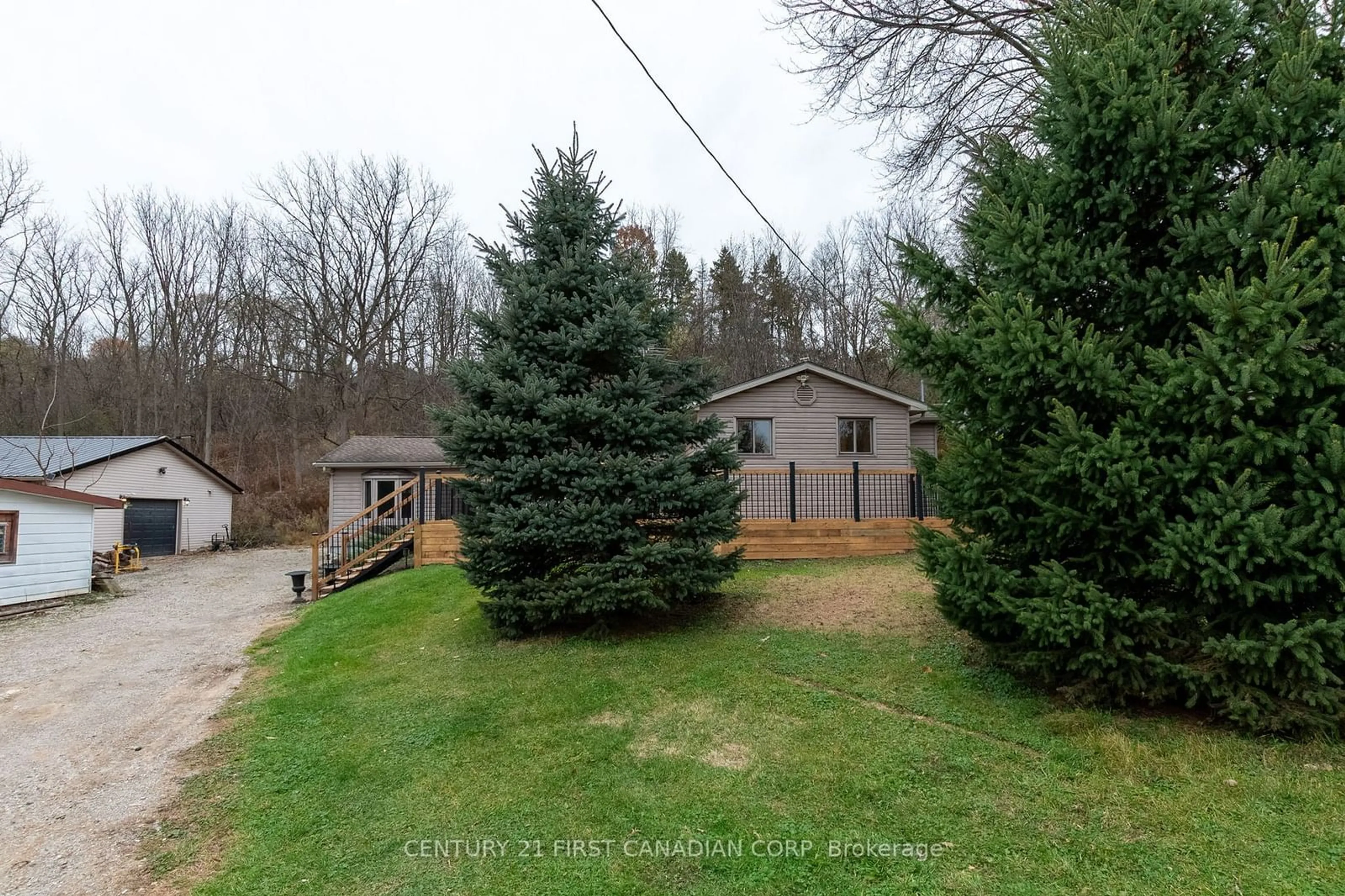 A pic from outside/outdoor area/front of a property/back of a property/a pic from drone, unknown for 12 Davis St, Central Elgin Ontario N5P 1X8