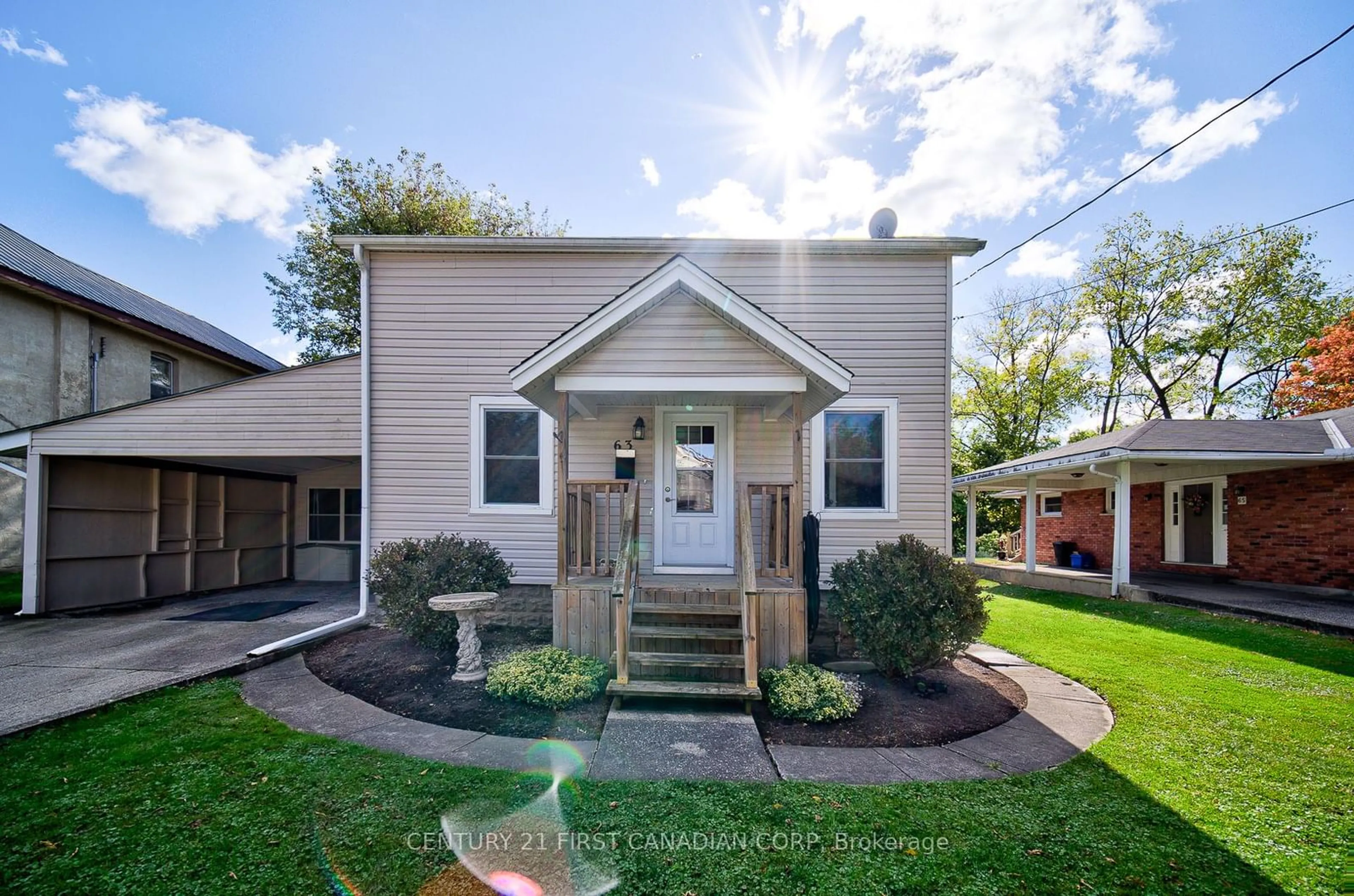 Home with vinyl exterior material, street for 63 Baldwin St, Tillsonburg Ontario N4G 2K4