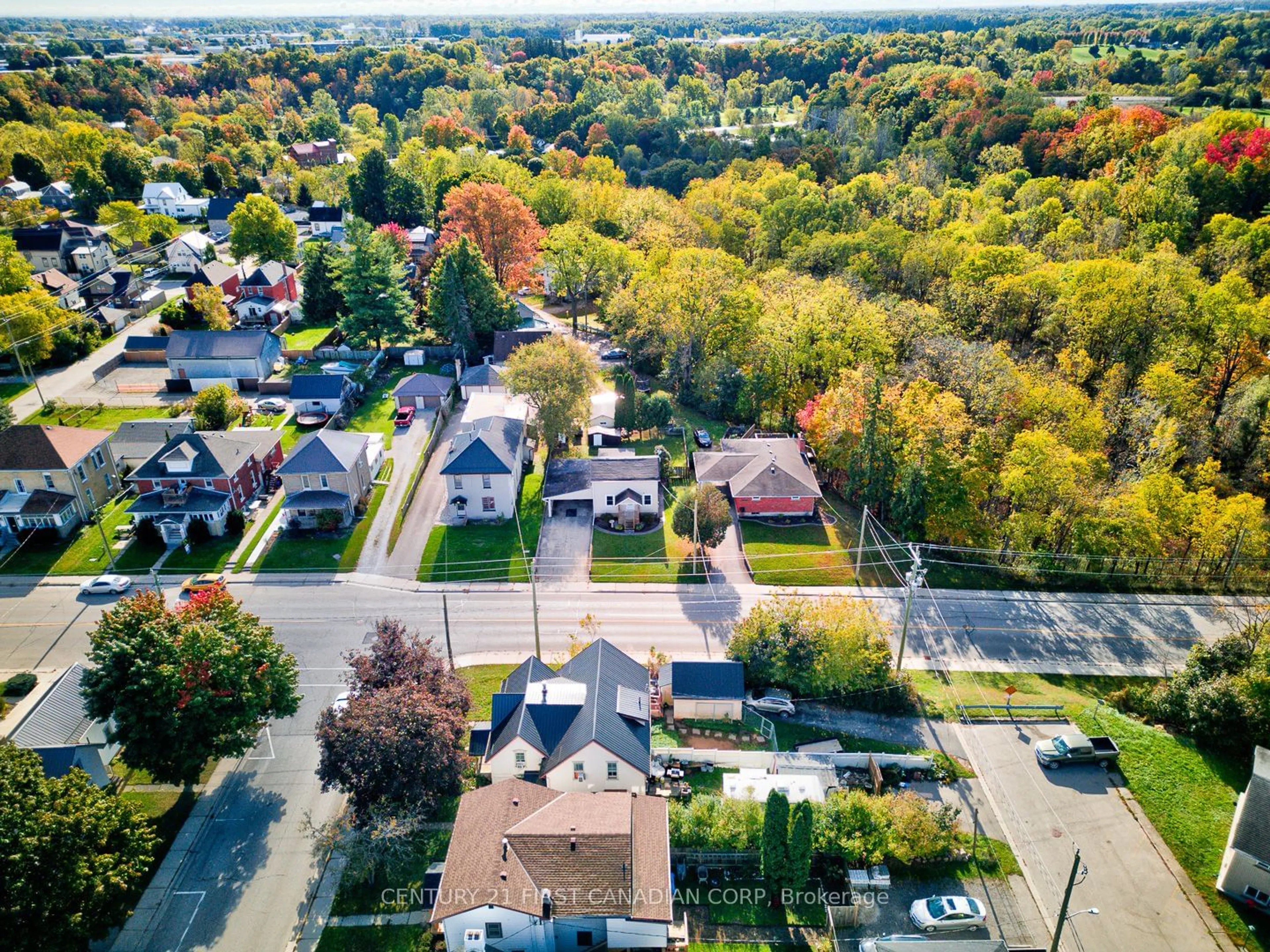 A pic from outside/outdoor area/front of a property/back of a property/a pic from drone, street for 63 Baldwin St, Tillsonburg Ontario N4G 2K4