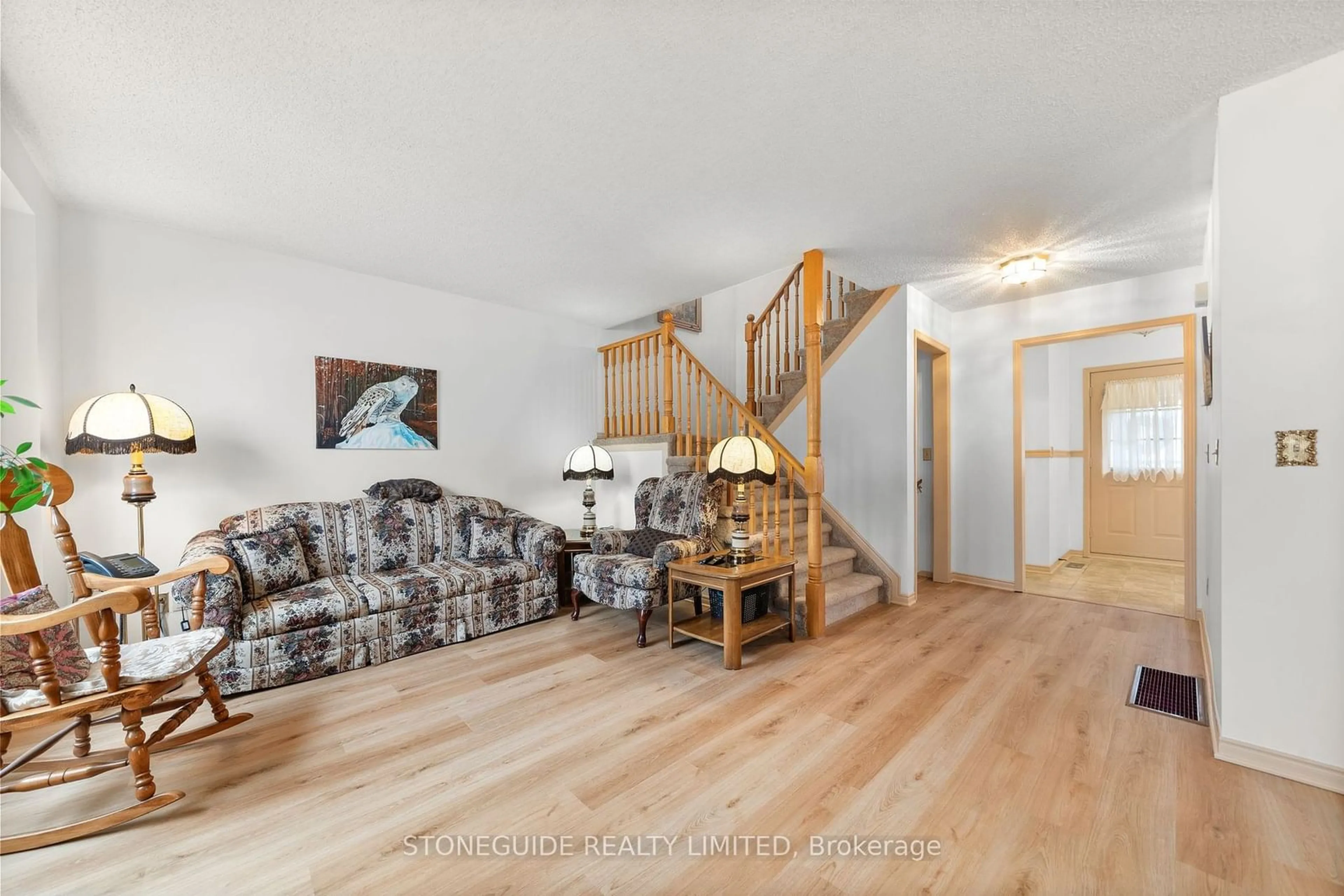 Living room with furniture, wood/laminate floor for 161 SUTHERLAND Cres, Cobourg Ontario K9A 5L2