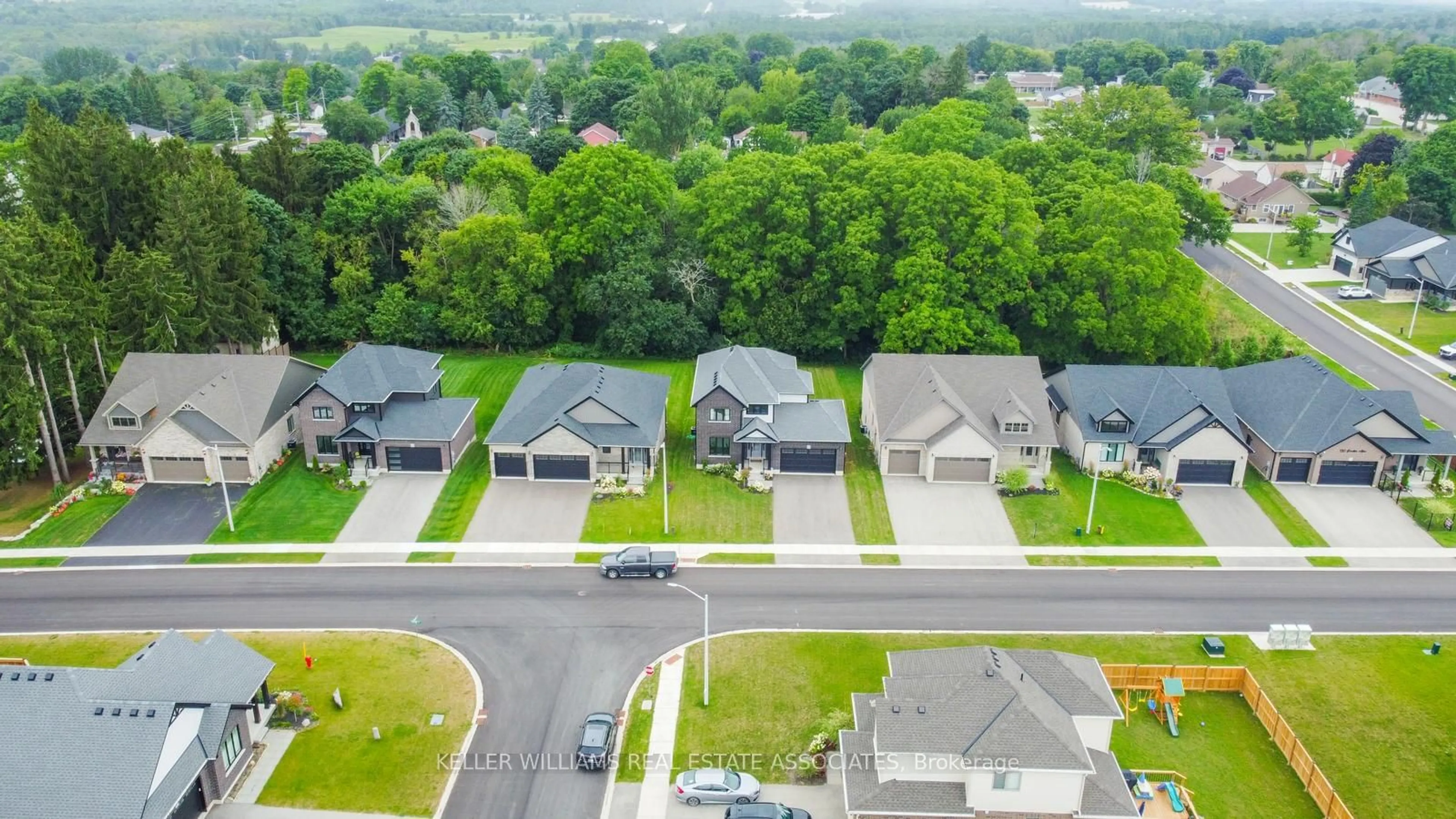 A pic from outside/outdoor area/front of a property/back of a property/a pic from drone, street for 150 Eccles Ave, West Grey Ontario N0G 1R0