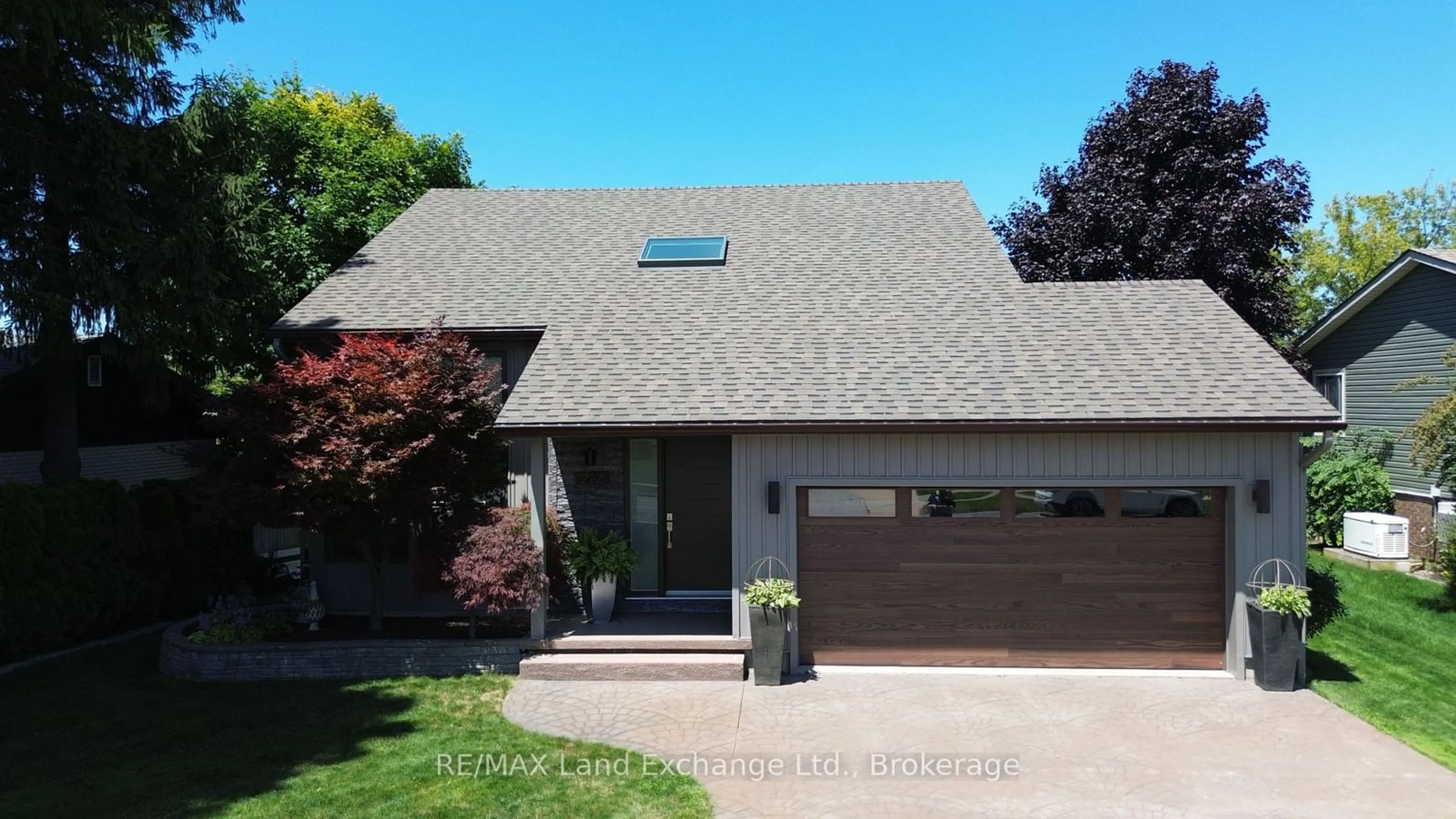 Home with vinyl exterior material, street for 222 Penetangore Row, Kincardine Ontario N2Z 2P6