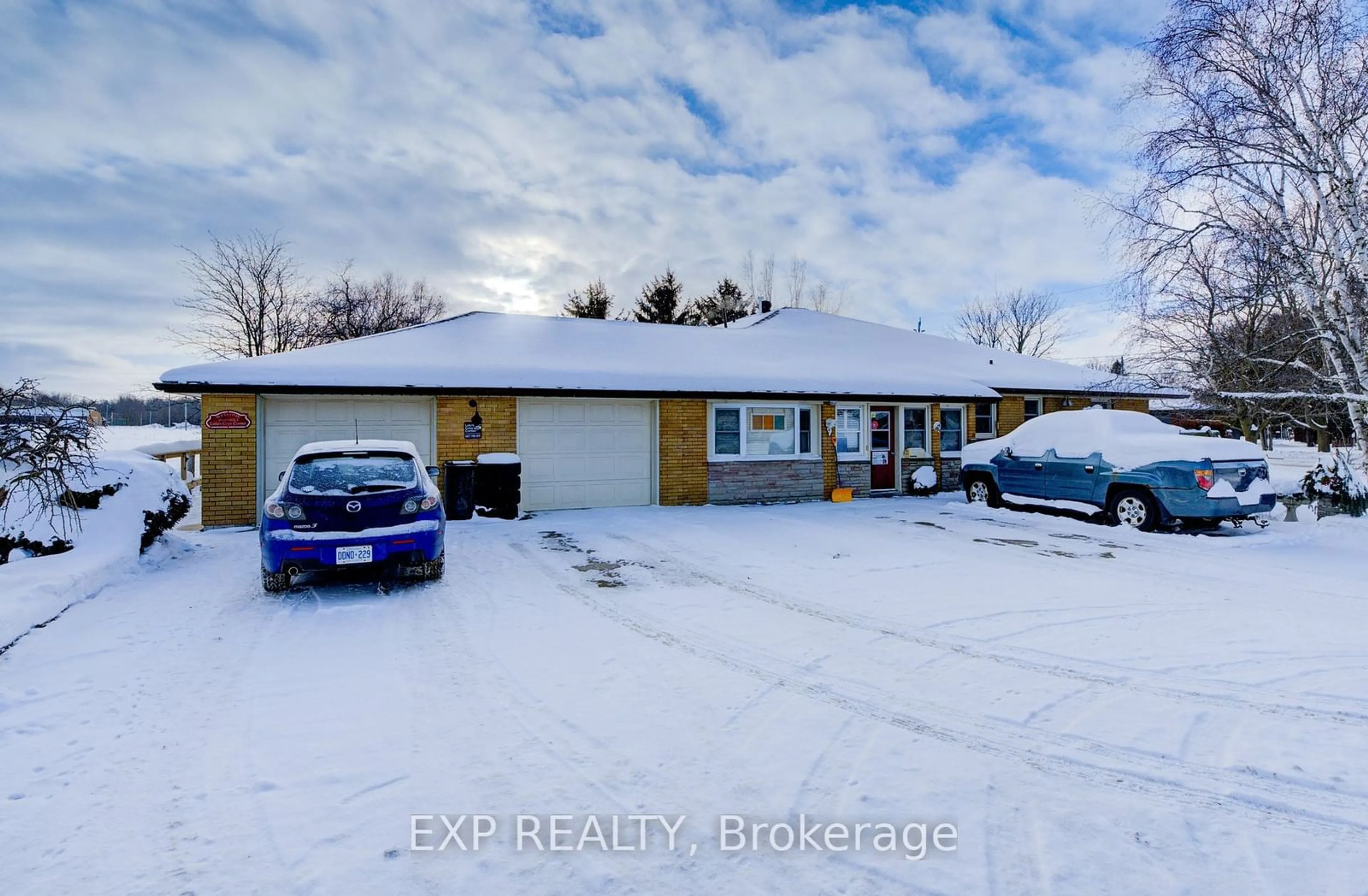 A pic from outside/outdoor area/front of a property/back of a property/a pic from drone, street for 43 George St, Minto Ontario N0G 1Z0