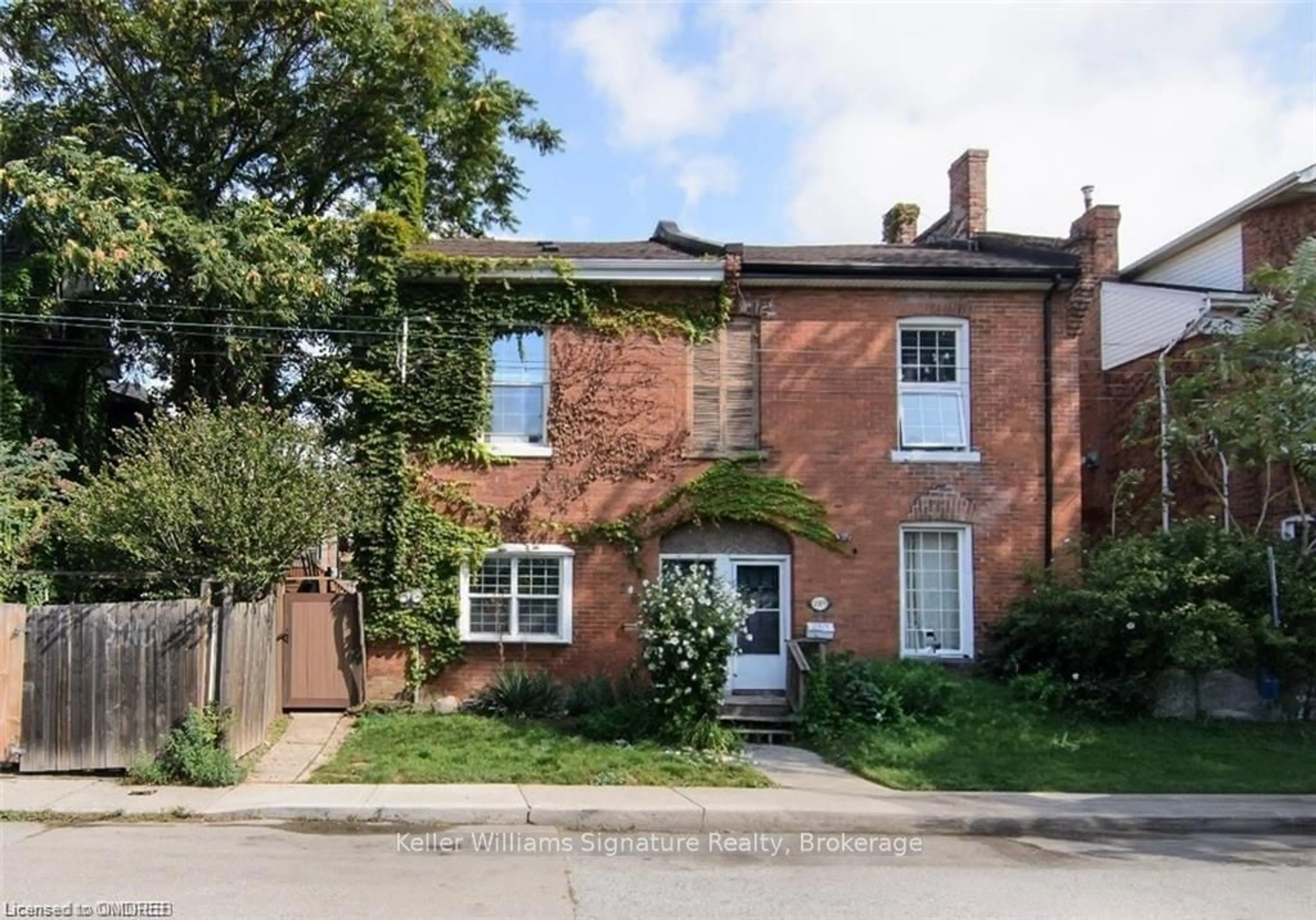 Home with brick exterior material, street for 287 Hunter St, Hamilton Ontario L8N 1N5