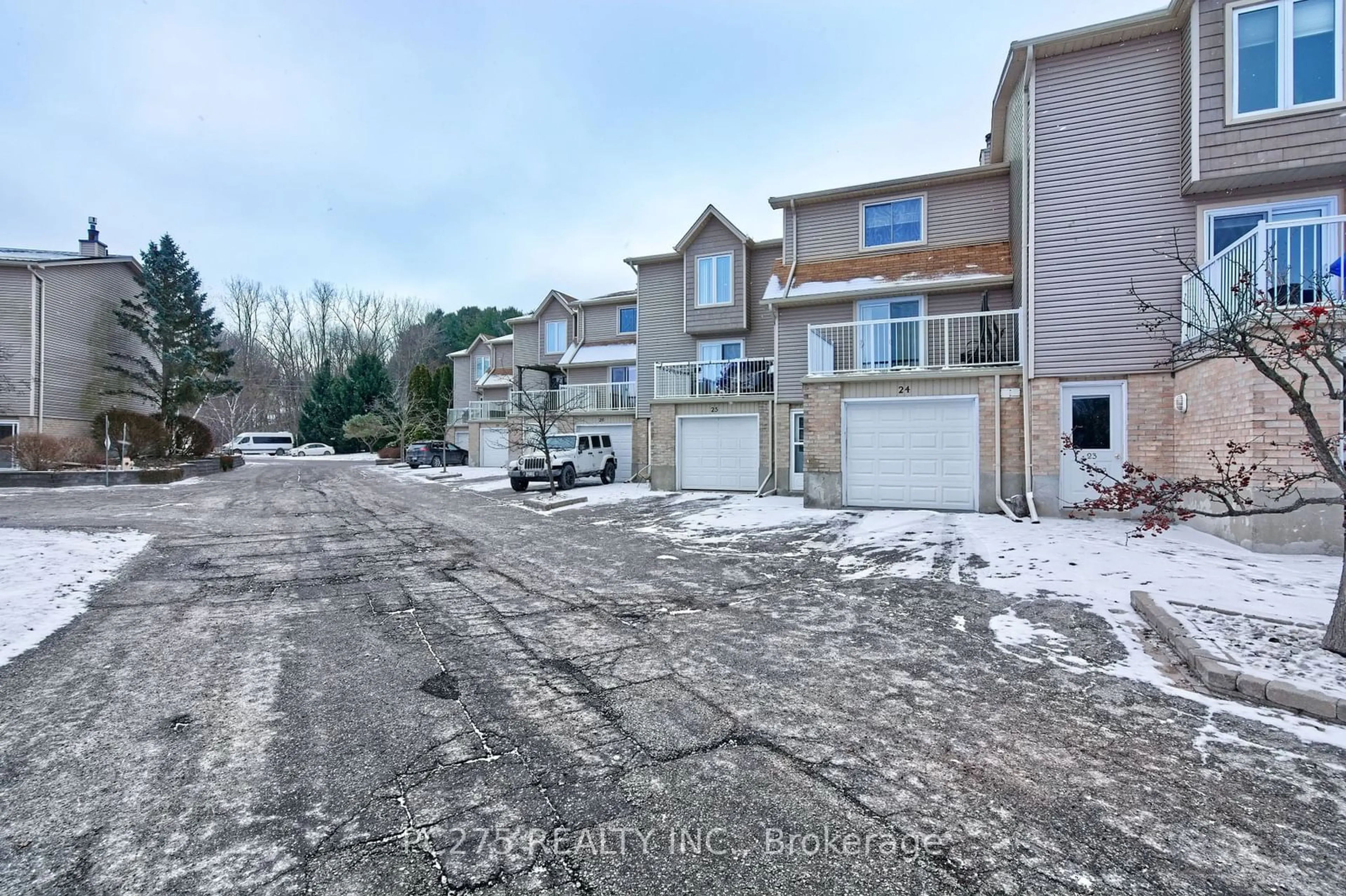 A pic from outside/outdoor area/front of a property/back of a property/a pic from drone, street for 301 Carlow Rd #24, Central Elgin Ontario N5L 1B7