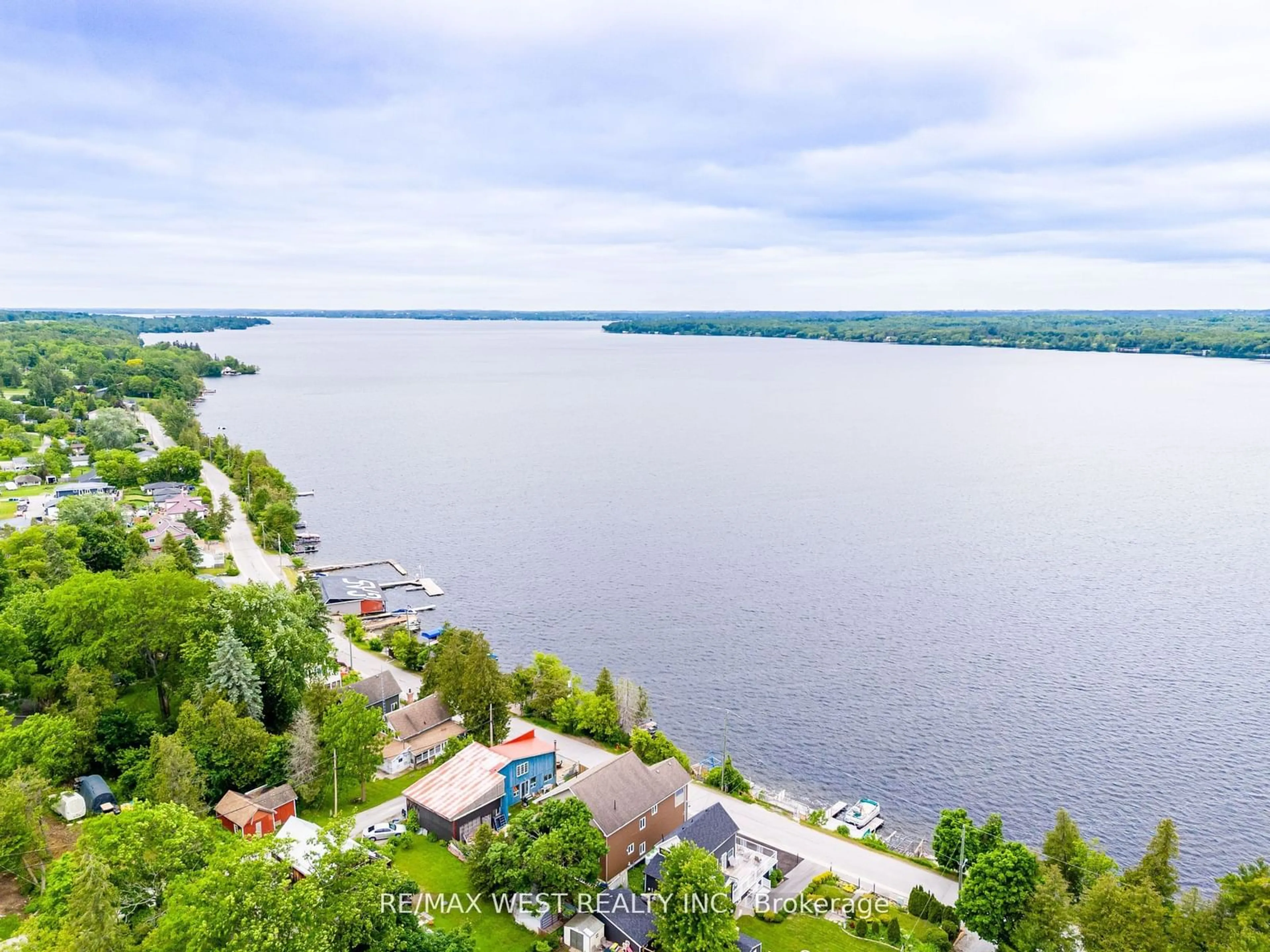 A pic from outside/outdoor area/front of a property/back of a property/a pic from drone, water/lake/river/ocean view for 31 Silver Birch St, Kawartha Lakes Ontario K0M 1L0