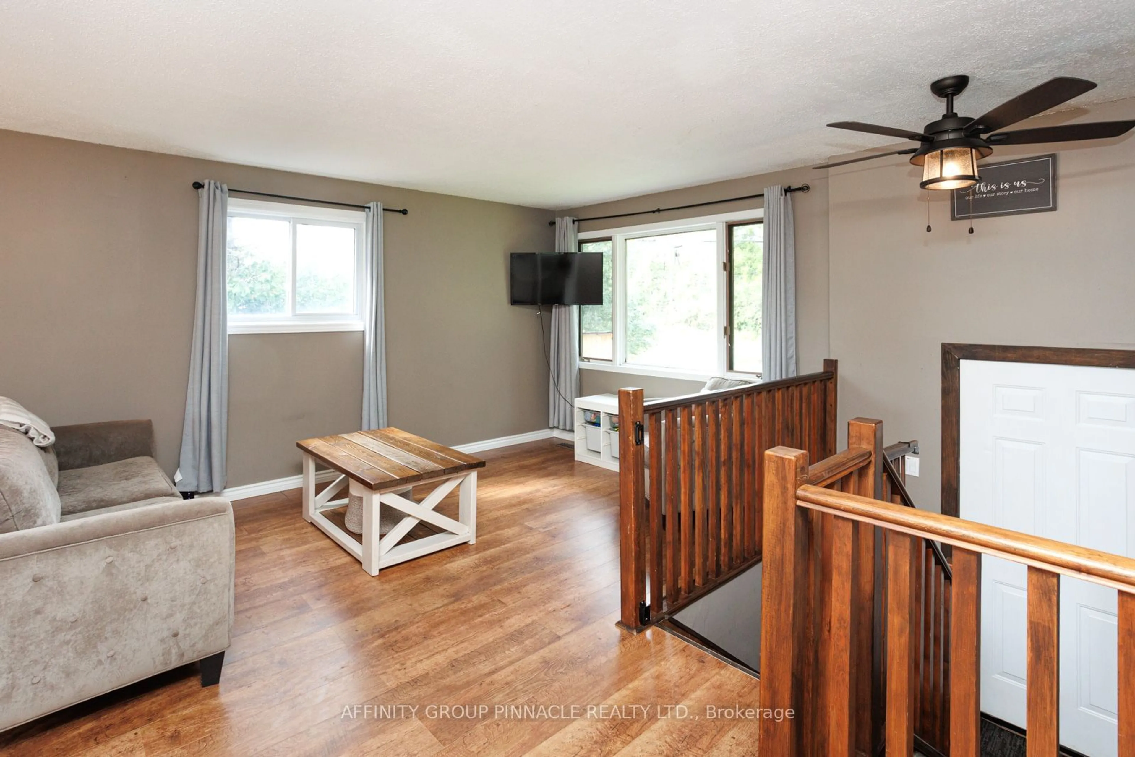 Living room with furniture, wood/laminate floor for 71 Goodman Rd, Kawartha Lakes Ontario K0M 1N0