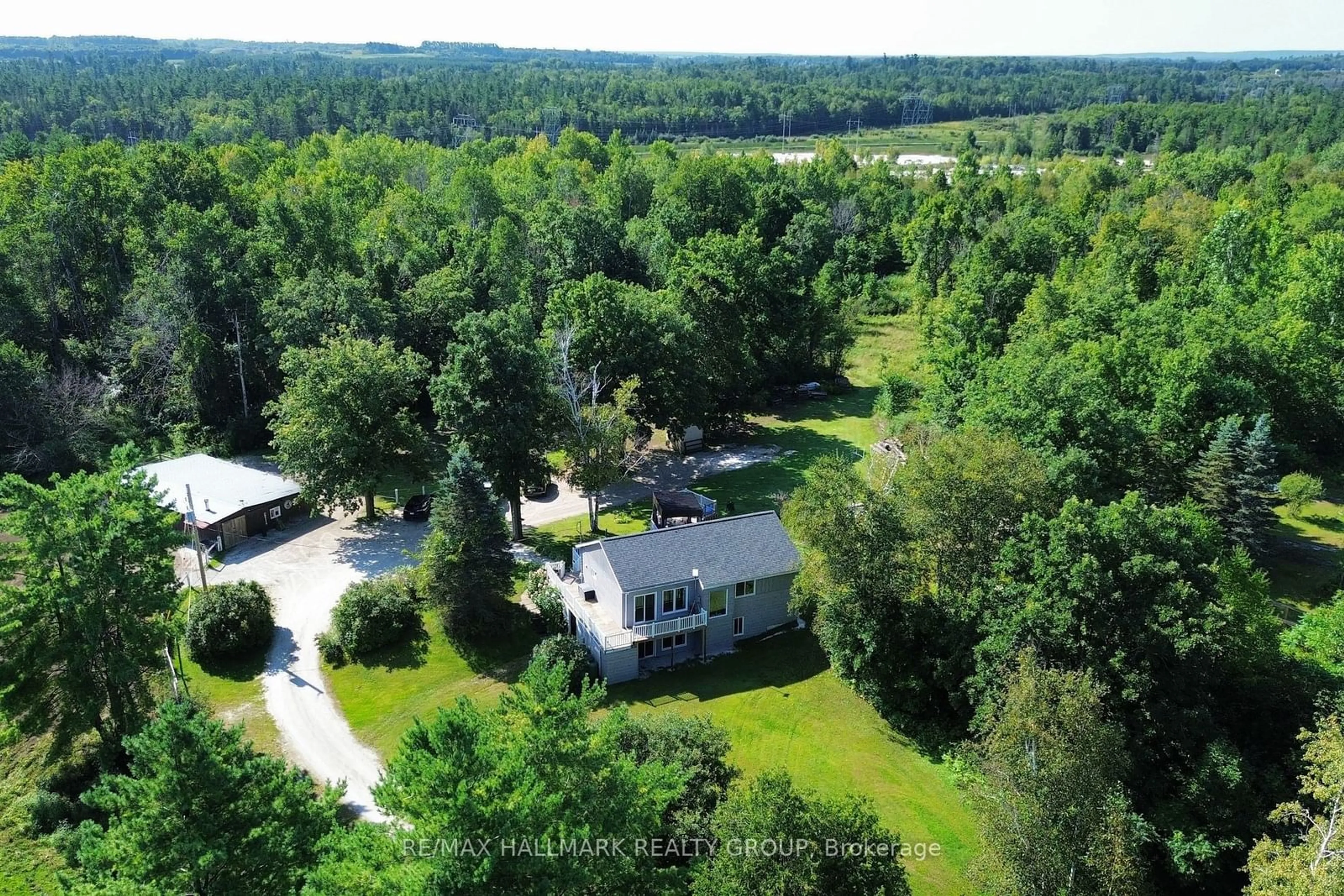 A pic from outside/outdoor area/front of a property/back of a property/a pic from drone, forest/trees view for 5055 LOGGERS Way, Carp - Dunrobin - Huntley - Fitzroy and Area Ontario K7S 3G7